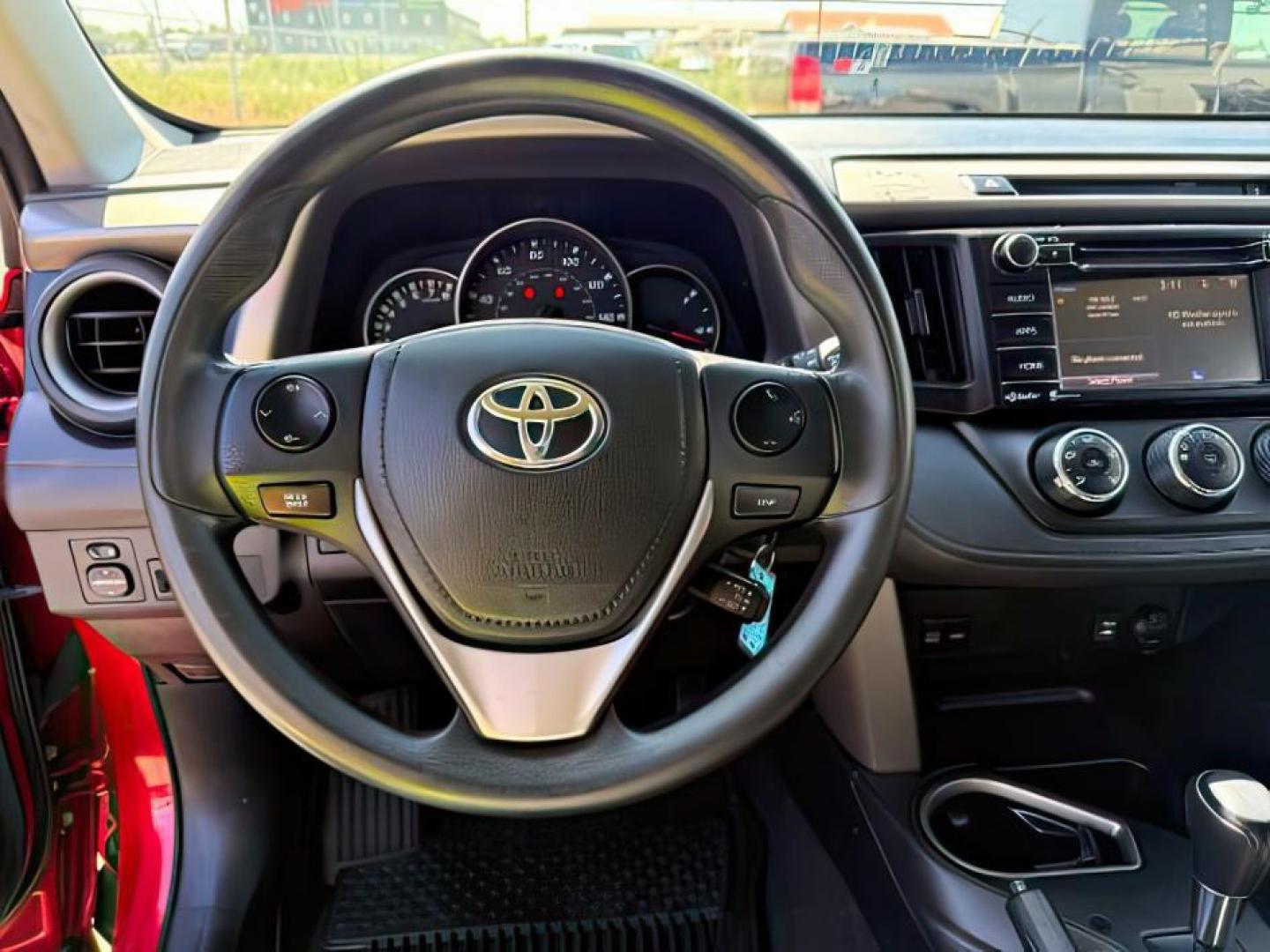 2016 Barcelona Red Metallic /Black Toyota RAV4 (2T3BFREV2GW) with an 25L I-4 DOHC engine, Automatic transmission, located at 1175 N Woodruff Ave, Idaho Falls, ID, 83401, 43.506901, -111.999657 - At Timberline Auto, finding a great deal on your next vehicle is always easy! Our experienced sales staff's goal is to help find you the right vehicle at the right price! Our knowledgeable finance department has options for almost any credit score. We offer extended service contract options to prote - Photo#13