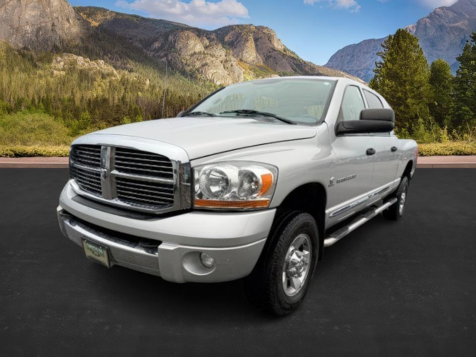 2006 SILVER /Medium Slate Gray Dodge Ram 3500 Laramie (3D7LX39C36G) with an Cummins 5.9L I-6 diesel direct injection engine, AUTOMATIC transmission, located at 1235 N Woodruff Ave., Idaho Falls, 83401, (208) 523-1053, 43.507172, -112.000488 - At Timberline Auto, finding a great deal on your next vehicle is always easy! Our experienced sales staff's goal is to help find you the right vehicle at the right price! Our knowledgeable finance department has options for almost any credit score. We offer extended service contract options to prote - Photo#0