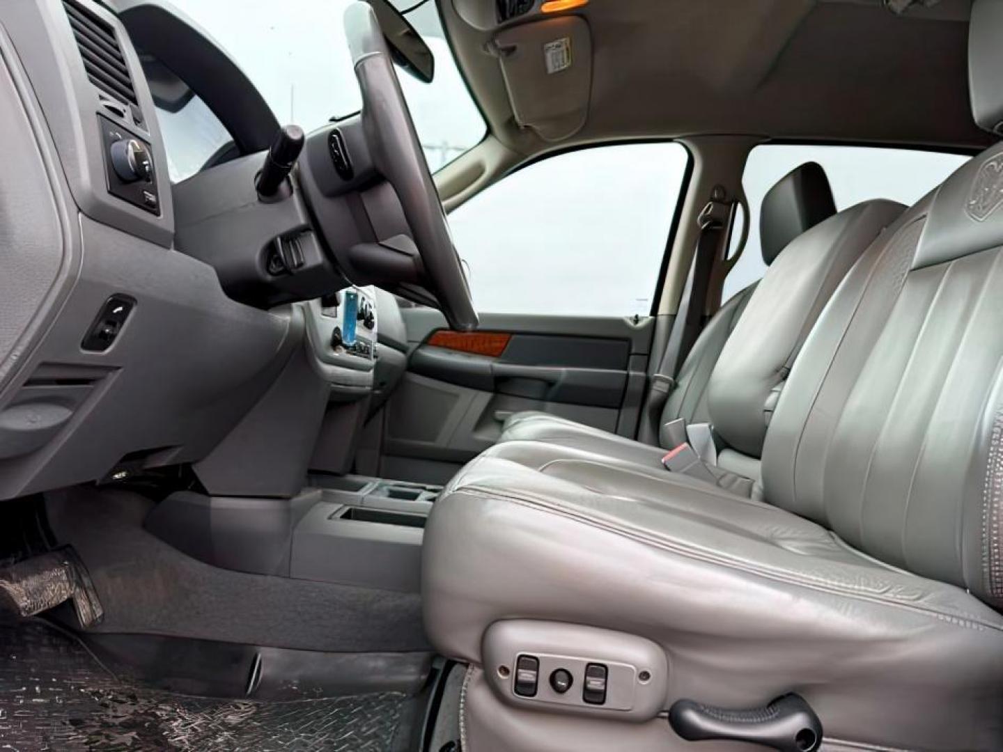 2006 SILVER /Medium Slate Gray Dodge Ram 3500 (3D7LX39C36G) with an Cummins 59L I-6 diesel direct injection engine, Automatic transmission, located at 1175 N Woodruff Ave, Idaho Falls, ID, 83401, 43.506901, -111.999657 - At Timberline Auto, finding a great deal on your next vehicle is always easy! Our experienced sales staff's goal is to help find you the right vehicle at the right price! Our knowledgeable finance department has options for almost any credit score. We offer extended service contract options to prote - Photo#11