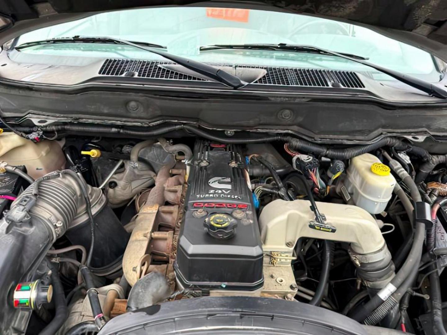 2006 SILVER /Medium Slate Gray Dodge Ram 3500 (3D7LX39C36G) with an Cummins 59L I-6 diesel direct injection engine, Automatic transmission, located at 1175 N Woodruff Ave, Idaho Falls, ID, 83401, 43.506901, -111.999657 - At Timberline Auto, finding a great deal on your next vehicle is always easy! Our experienced sales staff's goal is to help find you the right vehicle at the right price! Our knowledgeable finance department has options for almost any credit score. We offer extended service contract options to prote - Photo#21