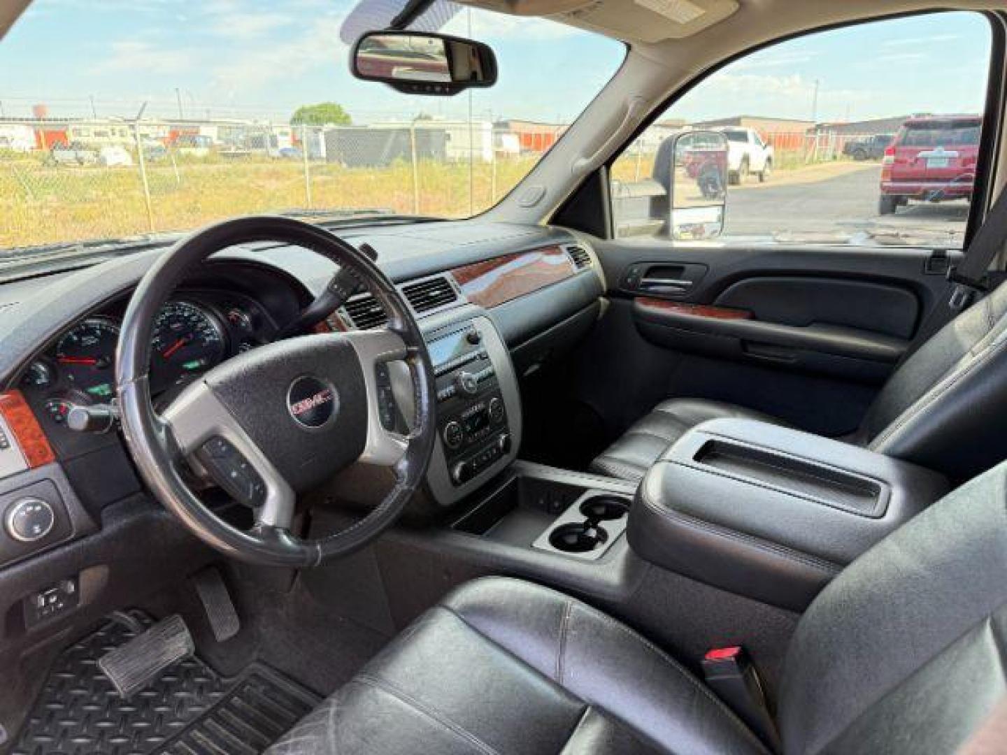 2009 Onyx Black /Ebony GMC Sierra 2500HD SLT (1GTHK43669F) with an 6.6 engine, AUTOMATIC transmission, located at 1235 N Woodruff Ave., Idaho Falls, 83401, (208) 523-1053, 43.507172, -112.000488 - At Timberline Auto, finding a great deal on your next vehicle is always easy! Our experienced sales staff's goal is to help find you the right vehicle at the right price! Our knowledgeable finance department has options for almost any credit score. We offer extended service contract options to prote - Photo#33