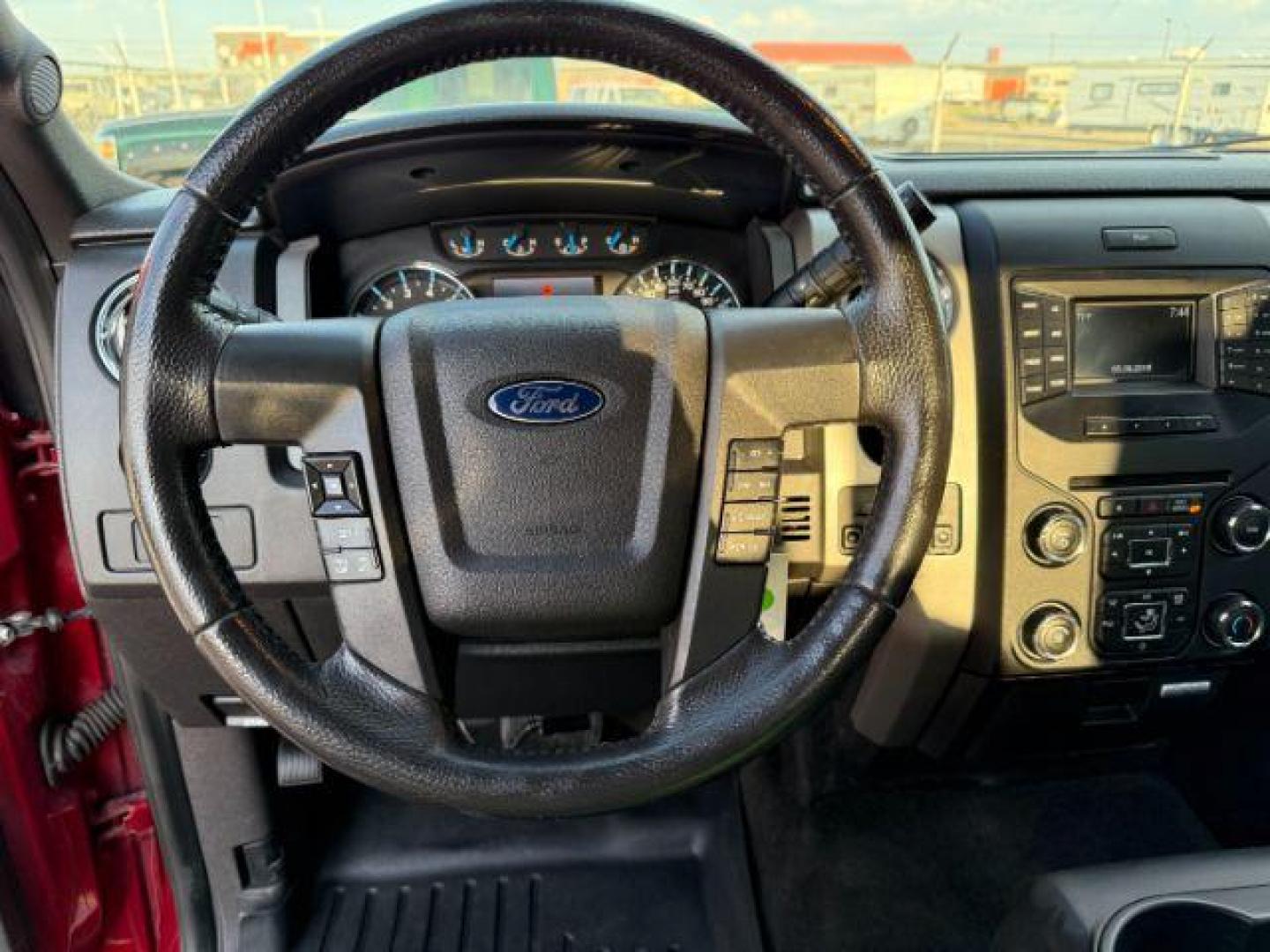 2014 Ruby Red Metallic Tinted Clearcoat /Steel Gray Ford F-150 (1FTFW1ET5EK) with an EcoBoost 35L V-6 gasoline direct injection engine, Automatic transmission, located at 1175 N Woodruff Ave, Idaho Falls, ID, 83401, 43.506901, -111.999657 - At Timberline Auto, finding a great deal on your next vehicle is always easy! Our experienced sales staff's goal is to help find you the right vehicle at the right price! Our knowledgeable finance department has options for almost any credit score. We offer extended service contract options to prote - Photo#32