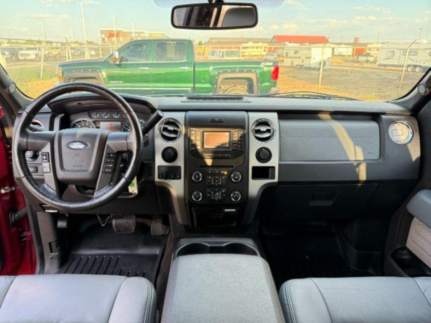 2014 Ruby Red Metallic Tinted Clearcoat /Steel Gray Ford F-150 (1FTFW1ET5EK) with an EcoBoost 35L V-6 gasoline direct injection engine, Automatic transmission, located at 1175 N Woodruff Ave, Idaho Falls, ID, 83401, 43.506901, -111.999657 - At Timberline Auto, finding a great deal on your next vehicle is always easy! Our experienced sales staff's goal is to help find you the right vehicle at the right price! Our knowledgeable finance department has options for almost any credit score. We offer extended service contract options to prote - Photo#35