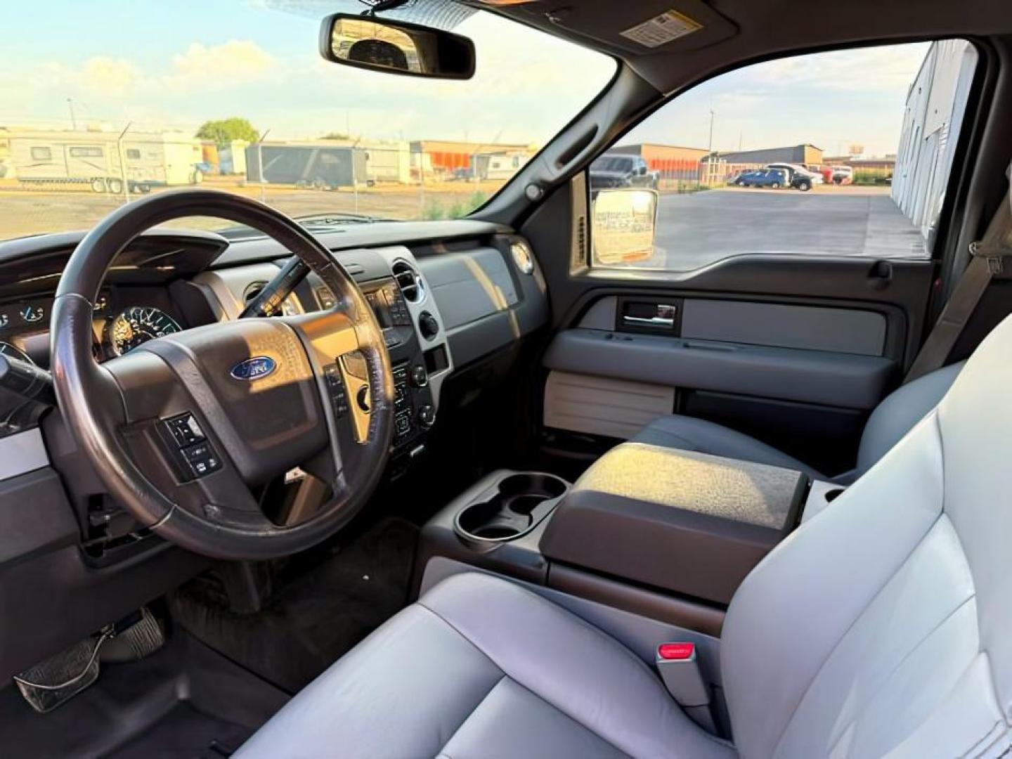 2014 Ruby Red Metallic Tinted Clearcoat /Steel Gray Ford F-150 (1FTFW1ET5EK) with an EcoBoost 35L V-6 gasoline direct injection engine, Automatic transmission, located at 1175 N Woodruff Ave, Idaho Falls, ID, 83401, 43.506901, -111.999657 - At Timberline Auto, finding a great deal on your next vehicle is always easy! Our experienced sales staff's goal is to help find you the right vehicle at the right price! Our knowledgeable finance department has options for almost any credit score. We offer extended service contract options to prote - Photo#12