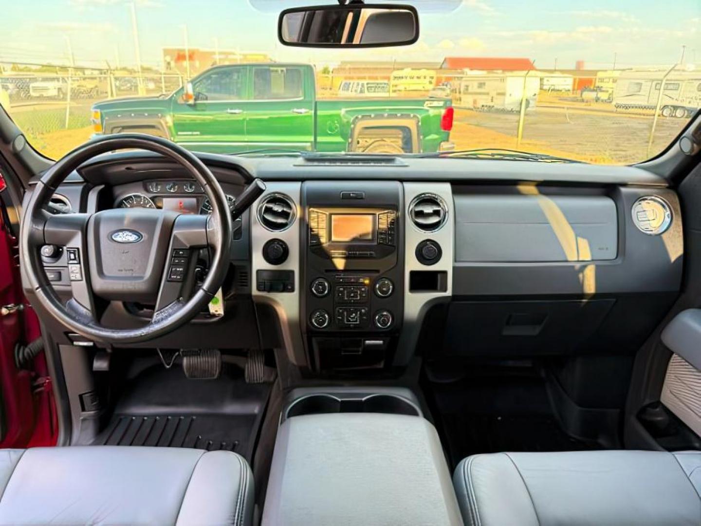 2014 Ruby Red Metallic Tinted Clearcoat /Steel Gray Ford F-150 (1FTFW1ET5EK) with an EcoBoost 35L V-6 gasoline direct injection engine, Automatic transmission, located at 1175 N Woodruff Ave, Idaho Falls, ID, 83401, 43.506901, -111.999657 - At Timberline Auto, finding a great deal on your next vehicle is always easy! Our experienced sales staff's goal is to help find you the right vehicle at the right price! Our knowledgeable finance department has options for almost any credit score. We offer extended service contract options to prote - Photo#16