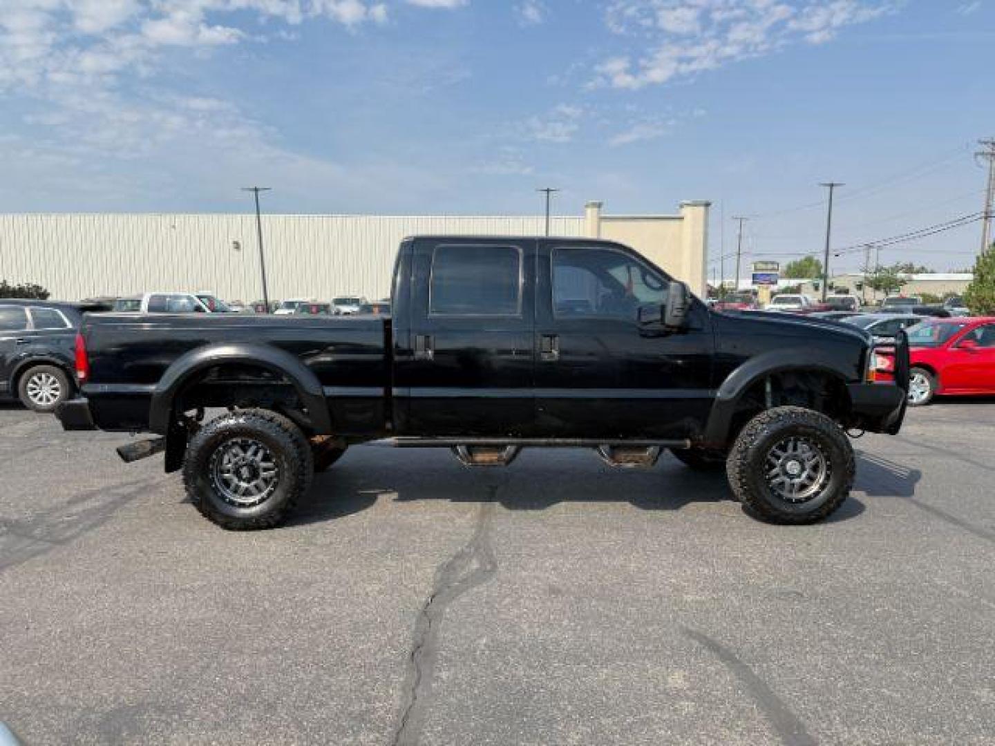 1999 BLACK /LEATHER Ford Super Duty F-250 (1FTNW21F5XE) with an 73L engine, Automatic transmission, located at 1175 N Woodruff Ave, Idaho Falls, ID, 83401, 43.506901, -111.999657 - At Timberline Auto, finding a great deal on your next vehicle is always easy! Our experienced sales staff's goal is to help find you the right vehicle at the right price! Our knowledgeable finance department has options for almost any credit score. We offer extended service contract options to prote - Photo#26