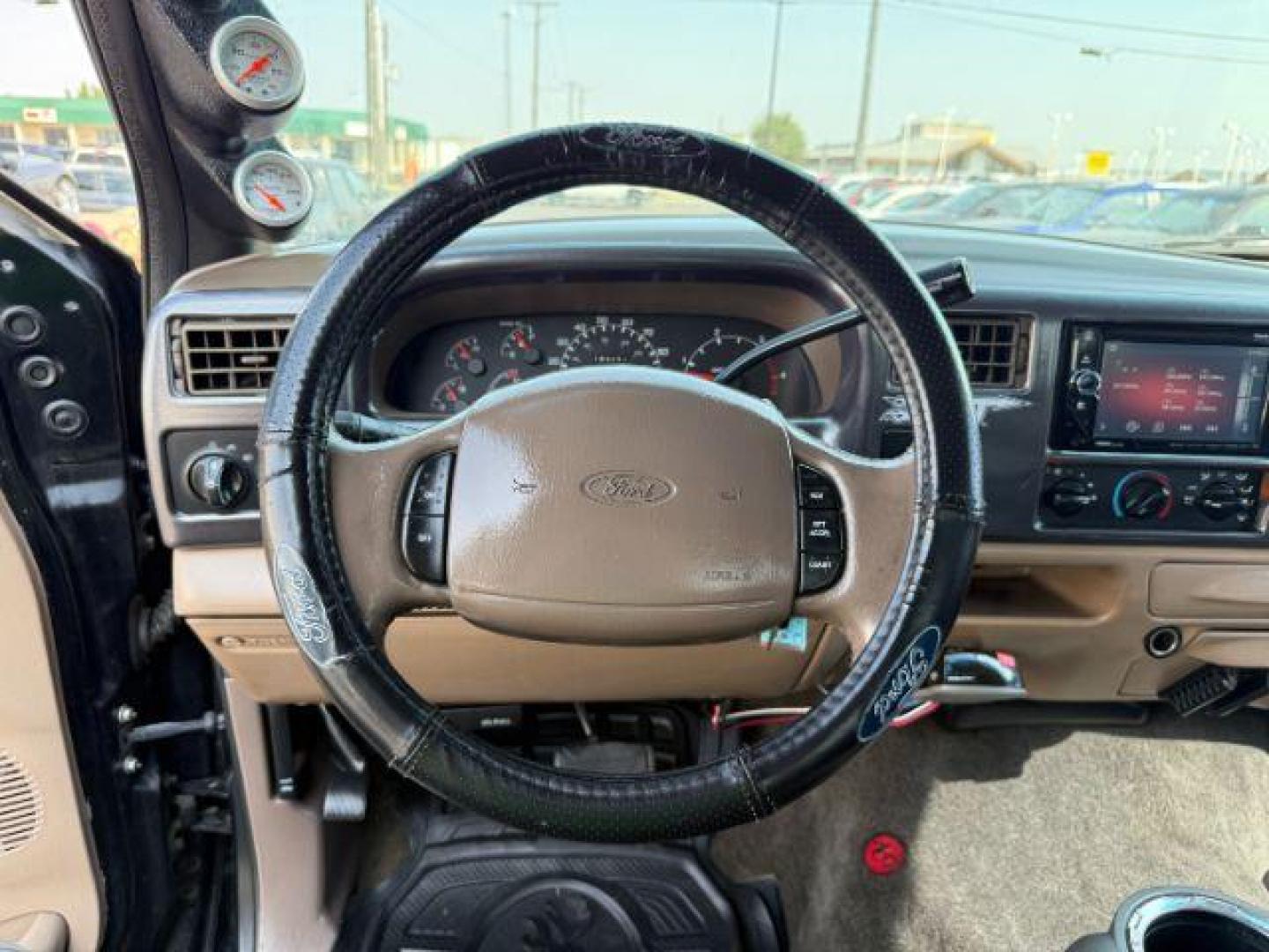 1999 BLACK /LEATHER Ford Super Duty F-250 (1FTNW21F5XE) with an 73L engine, Automatic transmission, located at 1175 N Woodruff Ave, Idaho Falls, ID, 83401, 43.506901, -111.999657 - At Timberline Auto, finding a great deal on your next vehicle is always easy! Our experienced sales staff's goal is to help find you the right vehicle at the right price! Our knowledgeable finance department has options for almost any credit score. We offer extended service contract options to prote - Photo#33