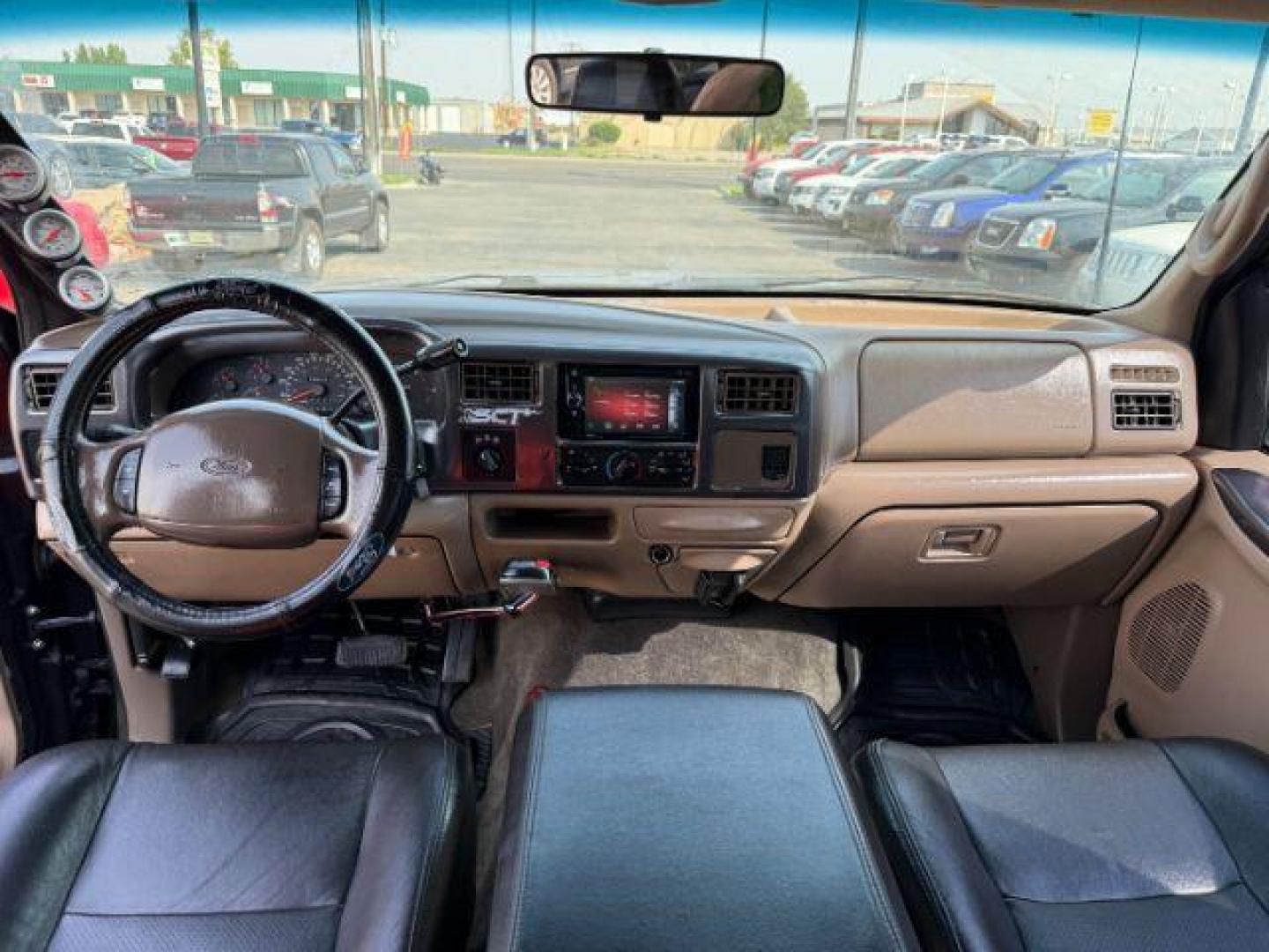 1999 BLACK /LEATHER Ford Super Duty F-250 (1FTNW21F5XE) with an 73L engine, Automatic transmission, located at 1175 N Woodruff Ave, Idaho Falls, ID, 83401, 43.506901, -111.999657 - At Timberline Auto, finding a great deal on your next vehicle is always easy! Our experienced sales staff's goal is to help find you the right vehicle at the right price! Our knowledgeable finance department has options for almost any credit score. We offer extended service contract options to prote - Photo#37
