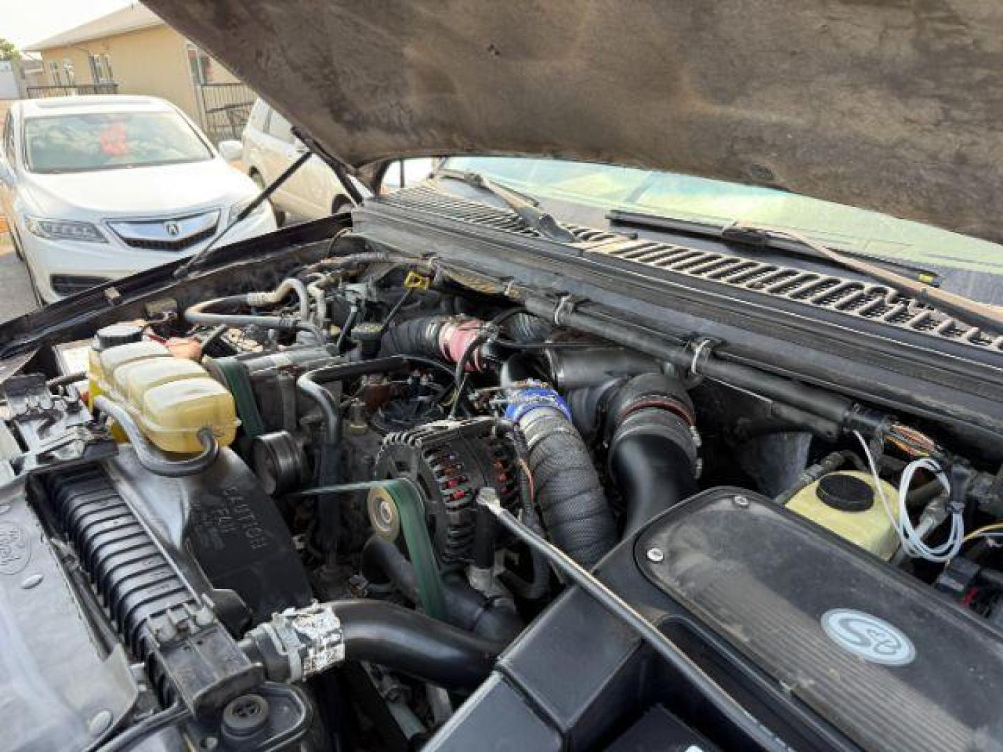 1999 BLACK /LEATHER Ford Super Duty F-250 (1FTNW21F5XE) with an 73L engine, Automatic transmission, located at 1175 N Woodruff Ave, Idaho Falls, ID, 83401, 43.506901, -111.999657 - At Timberline Auto, finding a great deal on your next vehicle is always easy! Our experienced sales staff's goal is to help find you the right vehicle at the right price! Our knowledgeable finance department has options for almost any credit score. We offer extended service contract options to prote - Photo#39