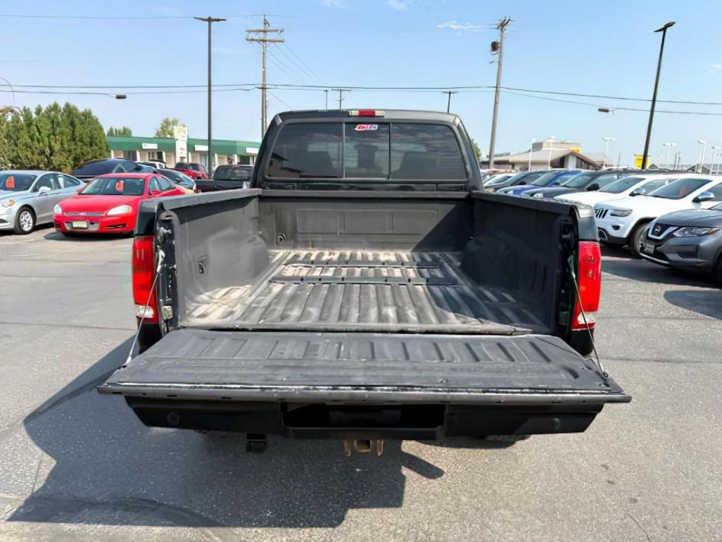 1999 BLACK /LEATHER Ford Super Duty F-250 (1FTNW21F5XE) with an 73L engine, Automatic transmission, located at 1175 N Woodruff Ave, Idaho Falls, ID, 83401, 43.506901, -111.999657 - At Timberline Auto, finding a great deal on your next vehicle is always easy! Our experienced sales staff's goal is to help find you the right vehicle at the right price! Our knowledgeable finance department has options for almost any credit score. We offer extended service contract options to prote - Photo#4