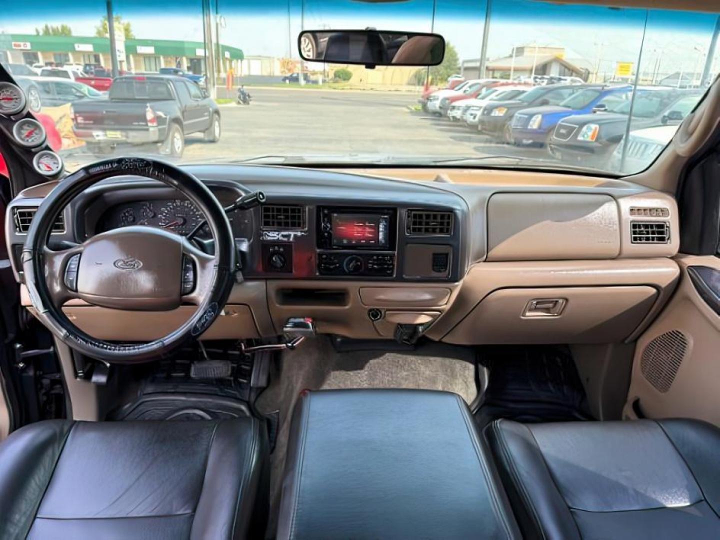 1999 BLACK /LEATHER Ford Super Duty F-250 (1FTNW21F5XE) with an 73L engine, Automatic transmission, located at 1175 N Woodruff Ave, Idaho Falls, ID, 83401, 43.506901, -111.999657 - At Timberline Auto, finding a great deal on your next vehicle is always easy! Our experienced sales staff's goal is to help find you the right vehicle at the right price! Our knowledgeable finance department has options for almost any credit score. We offer extended service contract options to prote - Photo#17