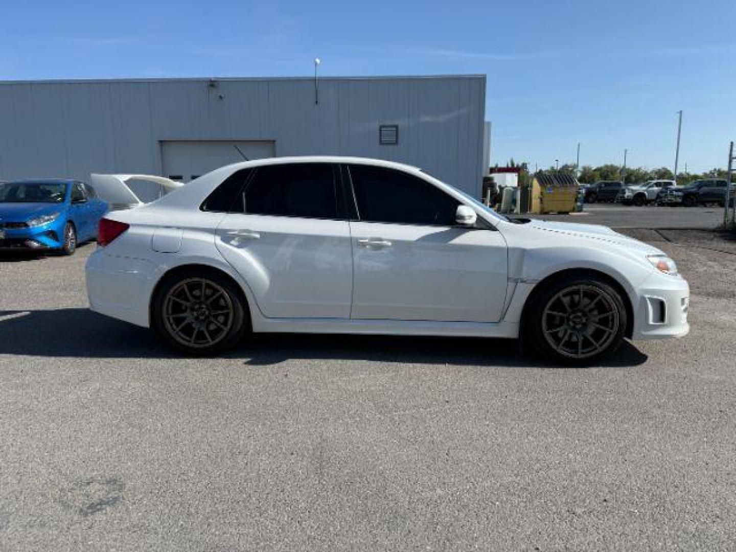 2014 Satin White Pearl /Black Subaru Impreza WRX STI (JF1GV8J60EL) with an 2.5L H-4 DOHC engine, MANUAL transmission, located at 1235 N Woodruff Ave., Idaho Falls, 83401, (208) 523-1053, 43.507172, -112.000488 - At Timberline Auto, finding a great deal on your next vehicle is always easy! Our experienced sales staff's goal is to help find you the right vehicle at the right price! Our knowledgeable finance department has options for almost any credit score. We offer extended service contract options to prote - Photo#25