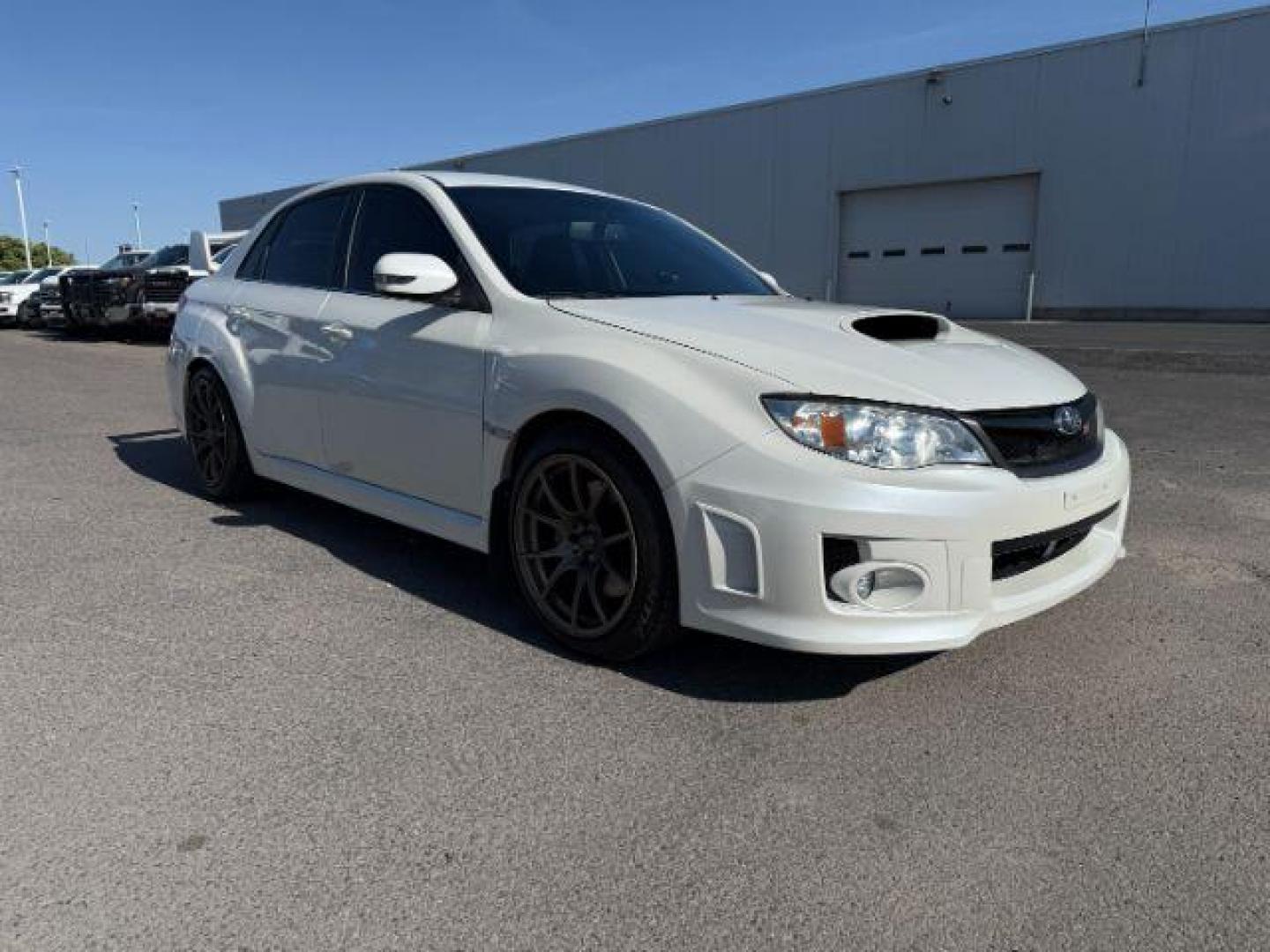 2014 Satin White Pearl /Black Subaru Impreza WRX STI (JF1GV8J60EL) with an 2.5L H-4 DOHC engine, MANUAL transmission, located at 1235 N Woodruff Ave., Idaho Falls, 83401, (208) 523-1053, 43.507172, -112.000488 - At Timberline Auto, finding a great deal on your next vehicle is always easy! Our experienced sales staff's goal is to help find you the right vehicle at the right price! Our knowledgeable finance department has options for almost any credit score. We offer extended service contract options to prote - Photo#26