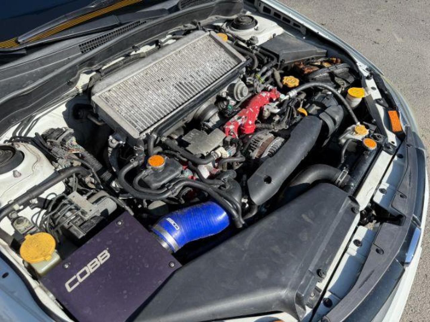 2014 Satin White Pearl /Black Subaru Impreza WRX STI (JF1GV8J60EL) with an 2.5L H-4 DOHC engine, MANUAL transmission, located at 1235 N Woodruff Ave., Idaho Falls, 83401, (208) 523-1053, 43.507172, -112.000488 - At Timberline Auto, finding a great deal on your next vehicle is always easy! Our experienced sales staff's goal is to help find you the right vehicle at the right price! Our knowledgeable finance department has options for almost any credit score. We offer extended service contract options to prote - Photo#39