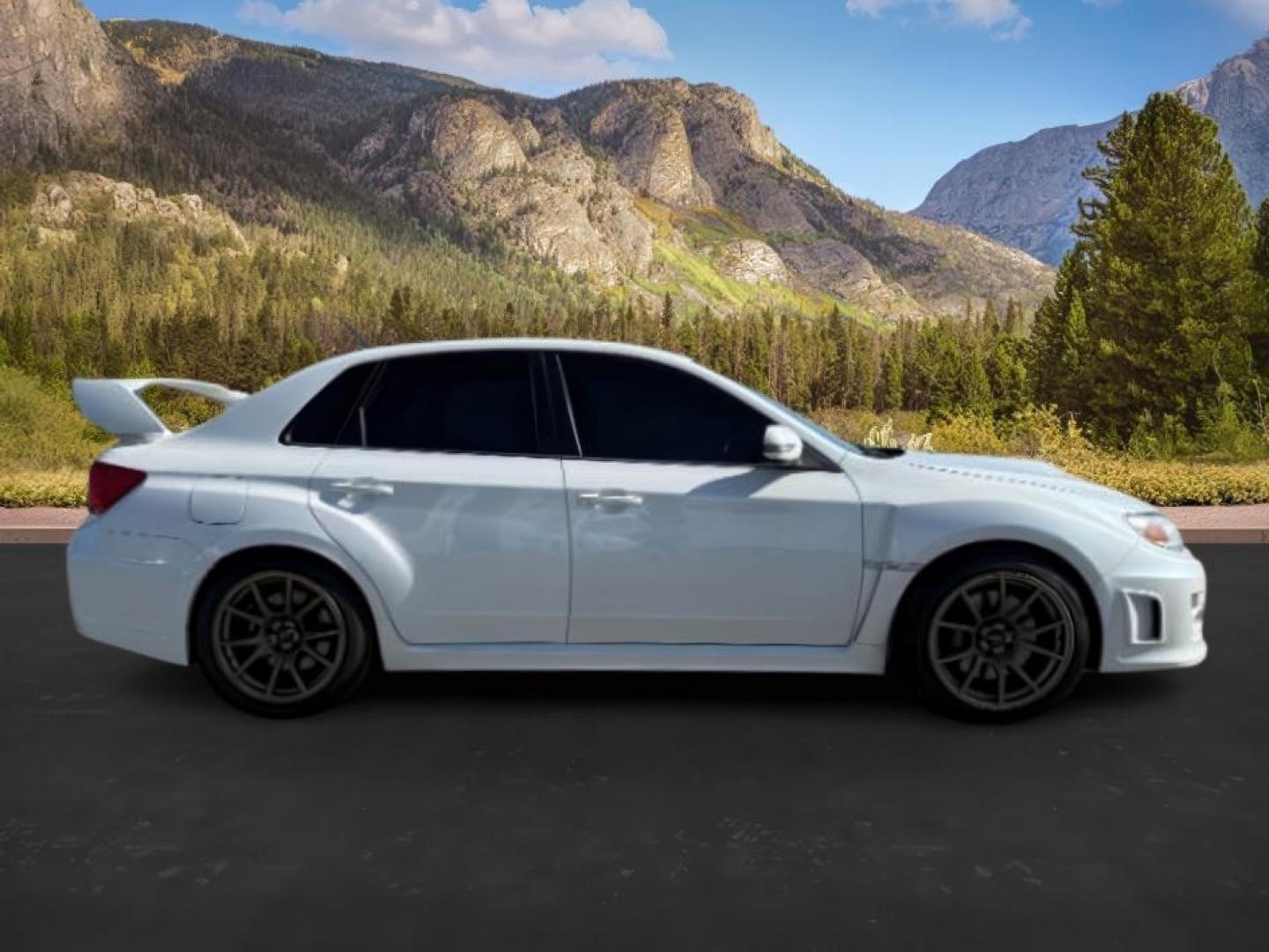 2014 Satin White Pearl /Black Subaru Impreza WRX STI (JF1GV8J60EL) with an 2.5L H-4 DOHC engine, MANUAL transmission, located at 1235 N Woodruff Ave., Idaho Falls, 83401, (208) 523-1053, 43.507172, -112.000488 - At Timberline Auto, finding a great deal on your next vehicle is always easy! Our experienced sales staff's goal is to help find you the right vehicle at the right price! Our knowledgeable finance department has options for almost any credit score. We offer extended service contract options to prote - Photo#5