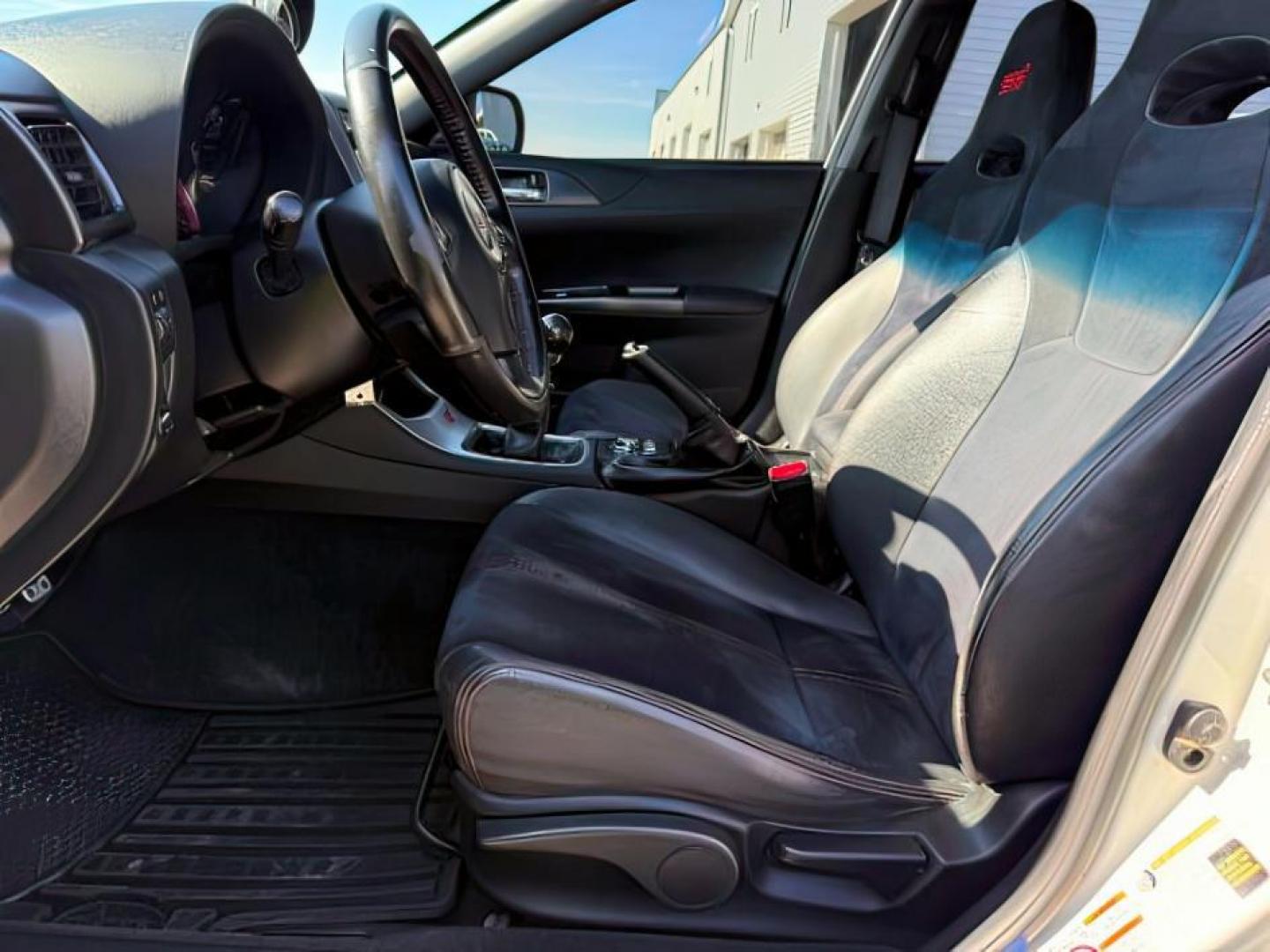 2014 Satin White Pearl /Black Subaru Impreza WRX STI (JF1GV8J60EL) with an 2.5L H-4 DOHC engine, MANUAL transmission, located at 1235 N Woodruff Ave., Idaho Falls, 83401, (208) 523-1053, 43.507172, -112.000488 - At Timberline Auto, finding a great deal on your next vehicle is always easy! Our experienced sales staff's goal is to help find you the right vehicle at the right price! Our knowledgeable finance department has options for almost any credit score. We offer extended service contract options to prote - Photo#9