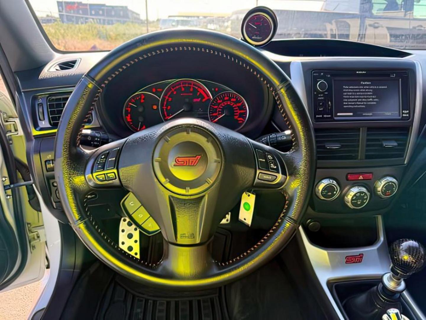2014 Satin White Pearl /Black Subaru Impreza WRX STI (JF1GV8J60EL) with an 2.5L H-4 DOHC engine, MANUAL transmission, located at 1235 N Woodruff Ave., Idaho Falls, 83401, (208) 523-1053, 43.507172, -112.000488 - At Timberline Auto, finding a great deal on your next vehicle is always easy! Our experienced sales staff's goal is to help find you the right vehicle at the right price! Our knowledgeable finance department has options for almost any credit score. We offer extended service contract options to prote - Photo#11