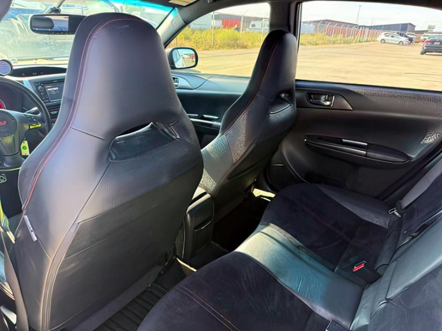 2014 Satin White Pearl /Black Subaru Impreza WRX STI (JF1GV8J60EL) with an 2.5L H-4 DOHC engine, MANUAL transmission, located at 1235 N Woodruff Ave., Idaho Falls, 83401, (208) 523-1053, 43.507172, -112.000488 - At Timberline Auto, finding a great deal on your next vehicle is always easy! Our experienced sales staff's goal is to help find you the right vehicle at the right price! Our knowledgeable finance department has options for almost any credit score. We offer extended service contract options to prote - Photo#18