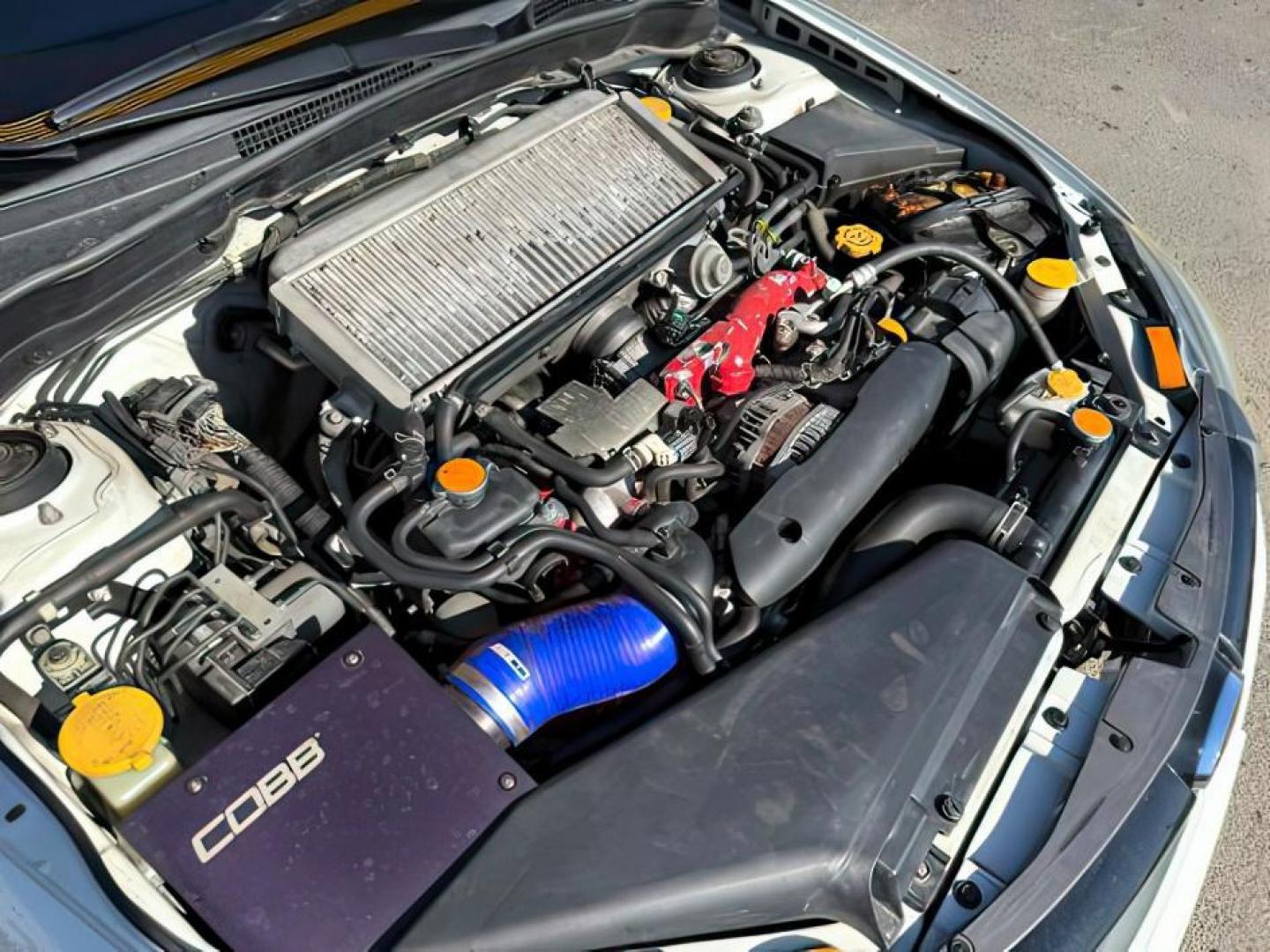 2014 Satin White Pearl /Black Subaru Impreza WRX STI (JF1GV8J60EL) with an 2.5L H-4 DOHC engine, MANUAL transmission, located at 1235 N Woodruff Ave., Idaho Falls, 83401, (208) 523-1053, 43.507172, -112.000488 - At Timberline Auto, finding a great deal on your next vehicle is always easy! Our experienced sales staff's goal is to help find you the right vehicle at the right price! Our knowledgeable finance department has options for almost any credit score. We offer extended service contract options to prote - Photo#19