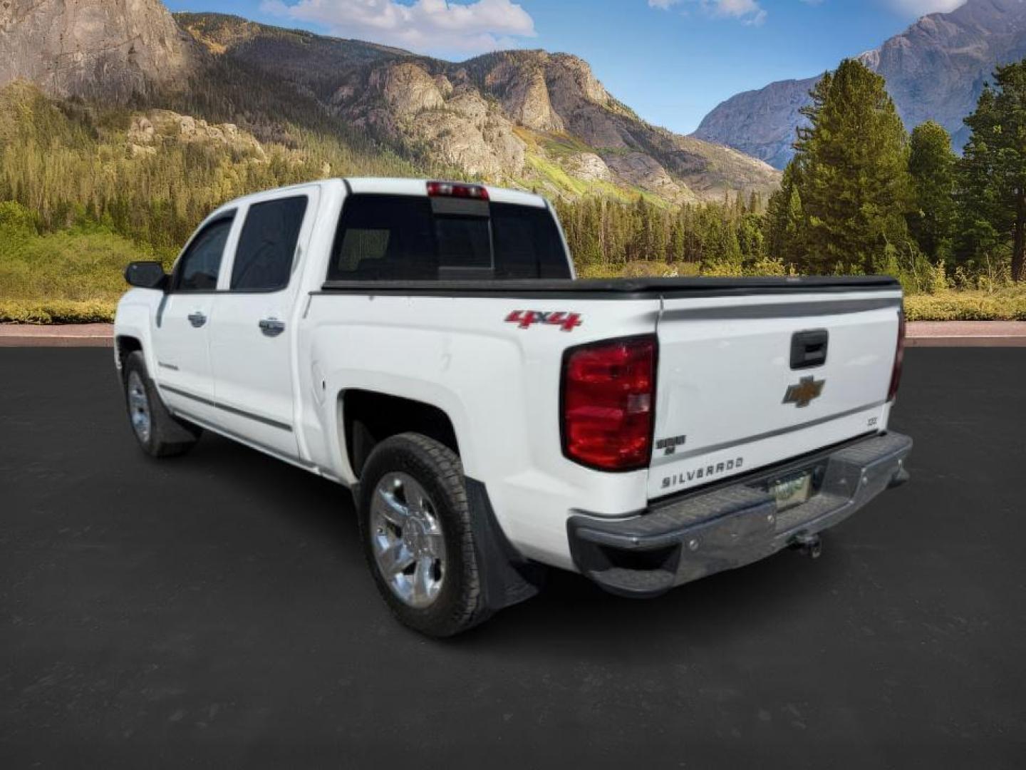 2014 White Diamond Tricoat /Jet Black Chevrolet Silverado 1500 (3GCUKSEC2EG) with an EcoTec3 53L V-8 gasoline direct injection engine, Automatic transmission, located at 1175 N Woodruff Ave, Idaho Falls, ID, 83401, 43.506901, -111.999657 - At Timberline Auto, finding a great deal on your next vehicle is always easy! Our experienced sales staff's goal is to help find you the right vehicle at the right price! Our knowledgeable finance department has options for almost any credit score. We offer extended service contract options to prote - Photo#2