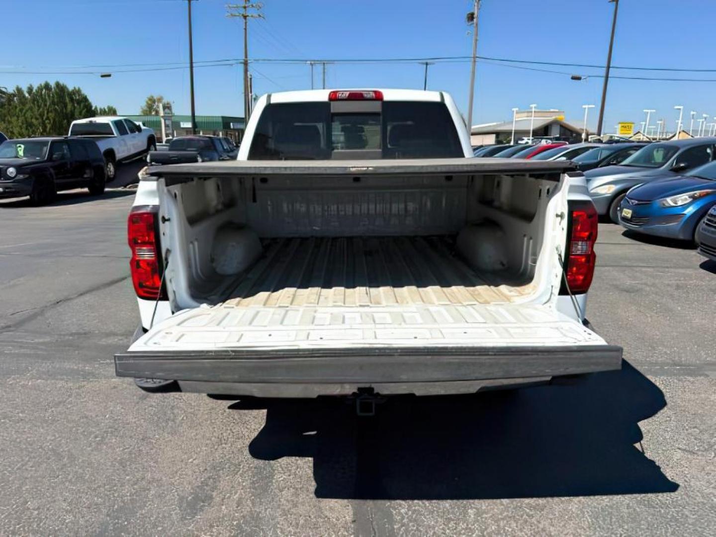 2014 White Diamond Tricoat /Jet Black Chevrolet Silverado 1500 (3GCUKSEC2EG) with an EcoTec3 53L V-8 gasoline direct injection engine, Automatic transmission, located at 1175 N Woodruff Ave, Idaho Falls, ID, 83401, 43.506901, -111.999657 - At Timberline Auto, finding a great deal on your next vehicle is always easy! Our experienced sales staff's goal is to help find you the right vehicle at the right price! Our knowledgeable finance department has options for almost any credit score. We offer extended service contract options to prote - Photo#4