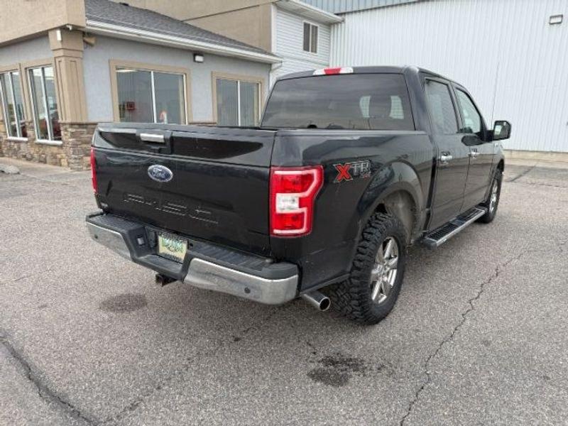 2020 Agate Black Metallic /Medium Light Camel Ford F-150 XLT (1FTEW1E51LK) with an V8, 5.0L engine, AUTOMATIC transmission, located at 1175 N Woodruff Ave, Idaho Falls, ID, 83401, 43.506901, -111.999657 - <b>Vehicle Details</b><br>Looking for a capable full-size pickup with proven power and premium comfort? This pre-owned 2020 Ford F-150 XLT 4WD is ready for your next job, road trip, or weekend adventure in Idaho Falls, ID. Powered by a V8, 5.0L Gasoline/E85 engine, this Ford F-150 delivers strong pe- Photo#5