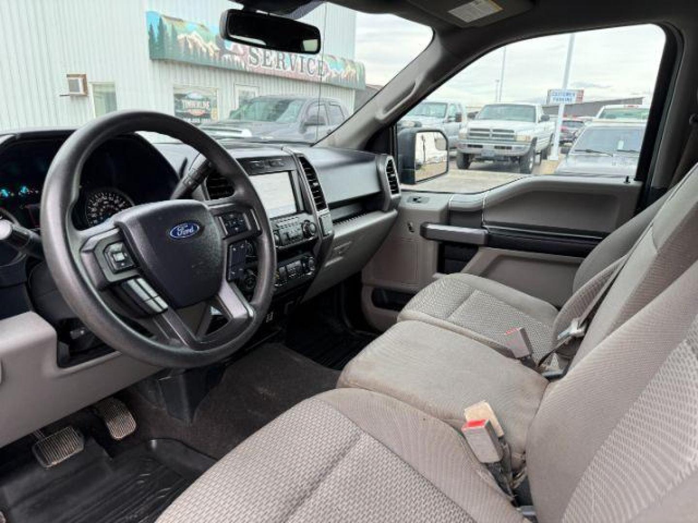 2020 Agate Black Metallic /Medium Earth Gray Ford F-150 (1FTEW1E51LK) with an 5L V-8 portdirect injection engine, Automatic transmission, located at 1175 N Woodruff Ave, Idaho Falls, ID, 83401, 43.506901, -111.999657 - At Timberline Auto, finding a great deal on your next vehicle is always easy! Our experienced sales staff's goal is to help find you the right vehicle at the right price! Our knowledgeable finance department has options for almost any credit score. We offer extended service contract options to prote - Photo#34