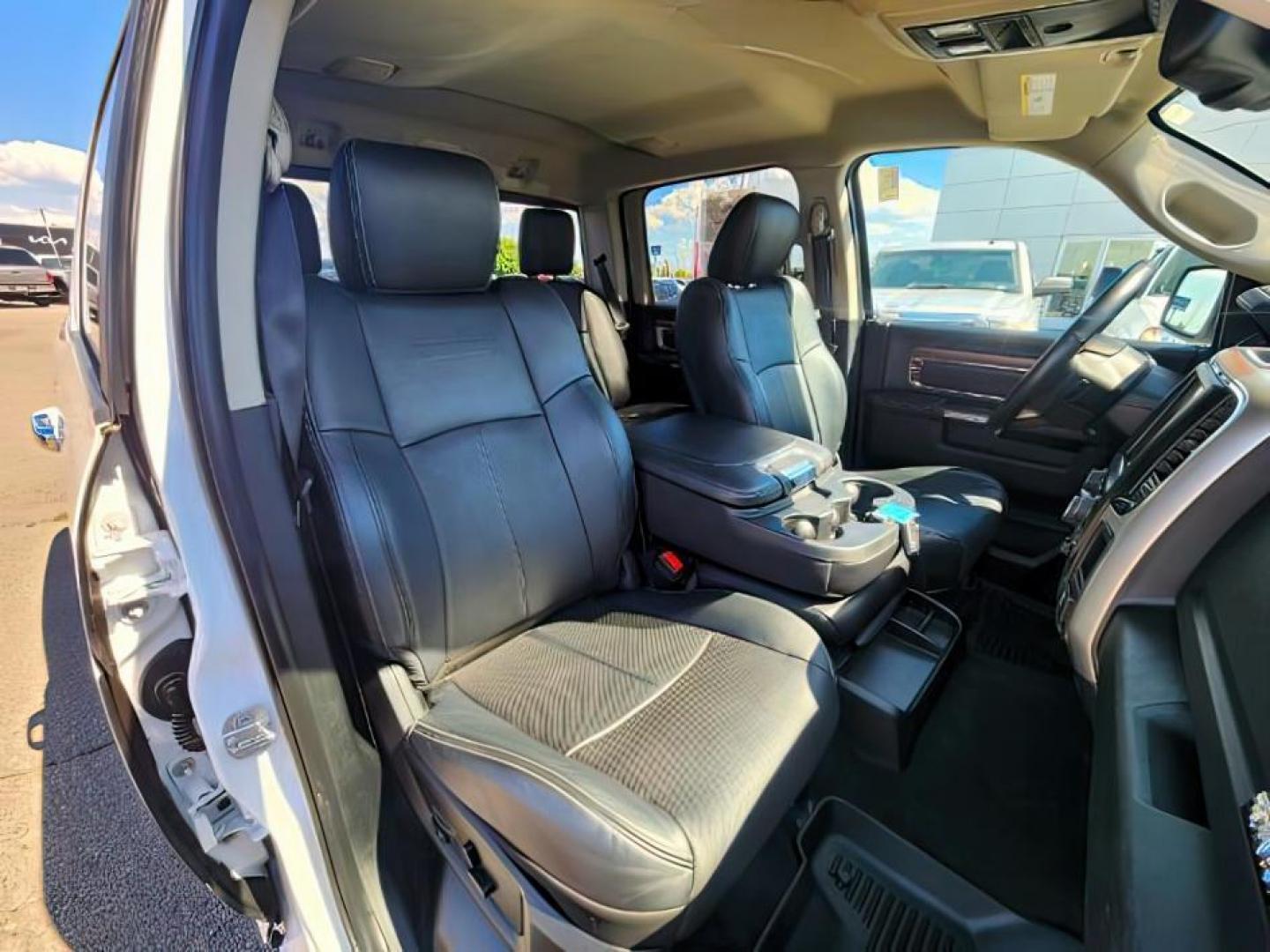 2018 Pearl White /Black Ram 1500 (1C6RR7NT1JS) with an HEMI 57L V-8 variable valve control engine, Automatic transmission, located at 1175 N Woodruff Ave, Idaho Falls, ID, 83401, 43.506901, -111.999657 - At Timberline Auto, finding a great deal on your next vehicle is always easy! Our experienced sales staff's goal is to help find you the right vehicle at the right price! Our knowledgeable finance department has options for almost any credit score. We offer extended service contract options to prote - Photo#18