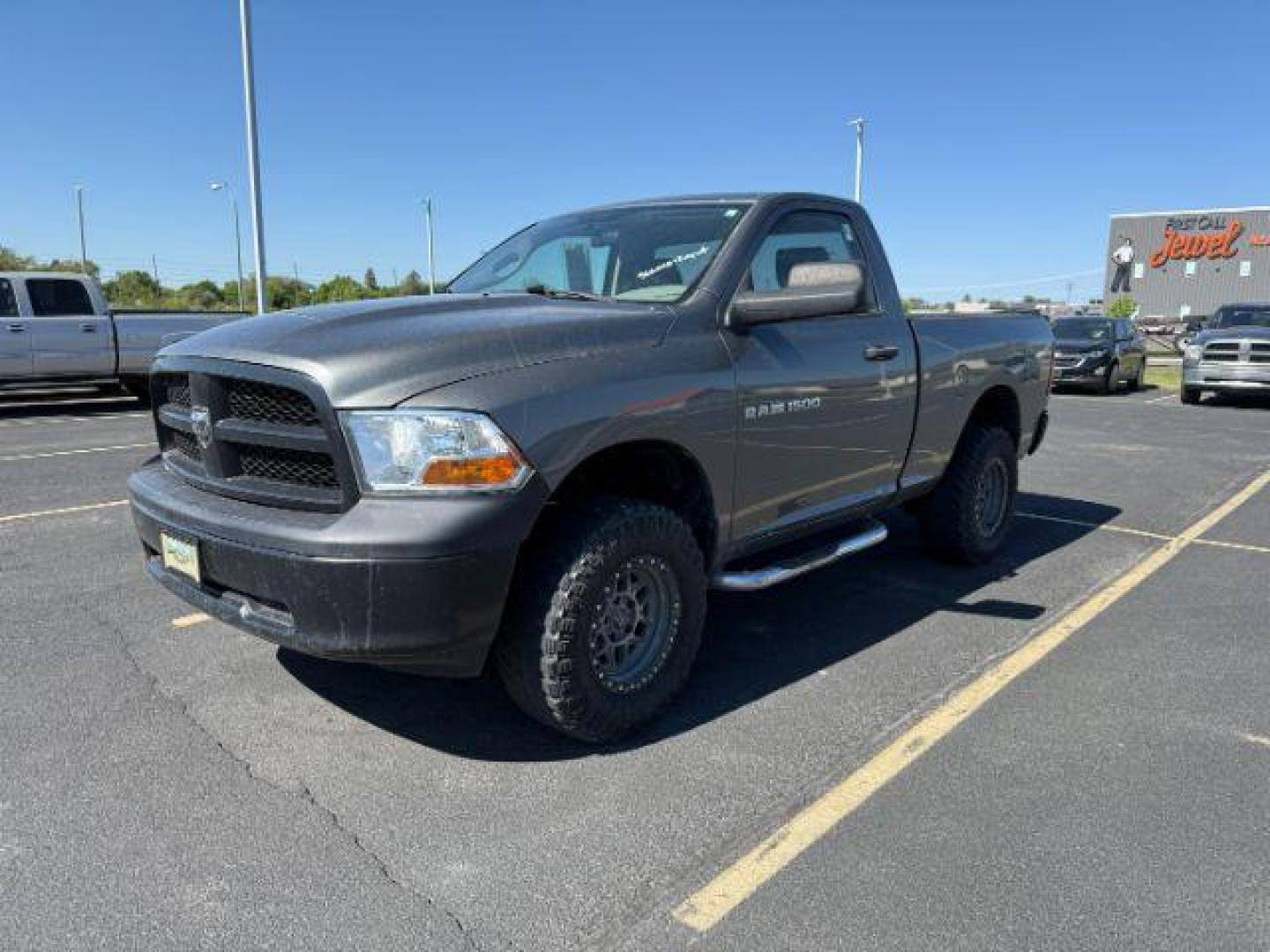 2012 GRAY /CLOTH Ram 1500 ST (3C6JD7AP8CG) with an 5.7 engine, AUTOMATIC transmission, located at 1235 N Woodruff Ave., Idaho Falls, 83401, (208) 523-1053, 43.507172, -112.000488 - At Timberline Auto, finding a great deal on your next vehicle is always easy! Our experienced sales staff's goal is to help find you the right vehicle at the right price! Our knowledgeable finance department has options for almost any credit score. We offer extended service contract options to prote - Photo#7