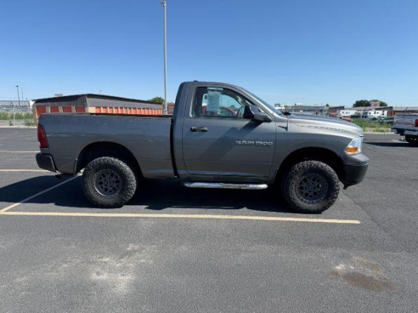 2012 GRAY /CLOTH Ram 1500 ST (3C6JD7AP8CG) with an 5.7 engine, AUTOMATIC transmission, located at 1235 N Woodruff Ave., Idaho Falls, 83401, (208) 523-1053, 43.507172, -112.000488 - At Timberline Auto, finding a great deal on your next vehicle is always easy! Our experienced sales staff's goal is to help find you the right vehicle at the right price! Our knowledgeable finance department has options for almost any credit score. We offer extended service contract options to prote - Photo#11