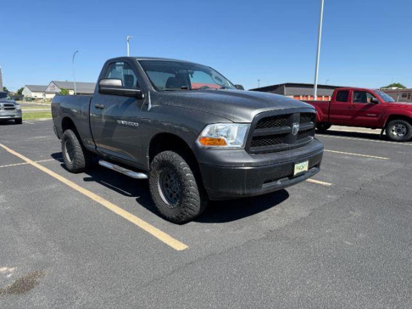 2012 GRAY /CLOTH Ram 1500 ST (3C6JD7AP8CG) with an 5.7 engine, AUTOMATIC transmission, located at 1235 N Woodruff Ave., Idaho Falls, 83401, (208) 523-1053, 43.507172, -112.000488 - At Timberline Auto, finding a great deal on your next vehicle is always easy! Our experienced sales staff's goal is to help find you the right vehicle at the right price! Our knowledgeable finance department has options for almost any credit score. We offer extended service contract options to prote - Photo#12