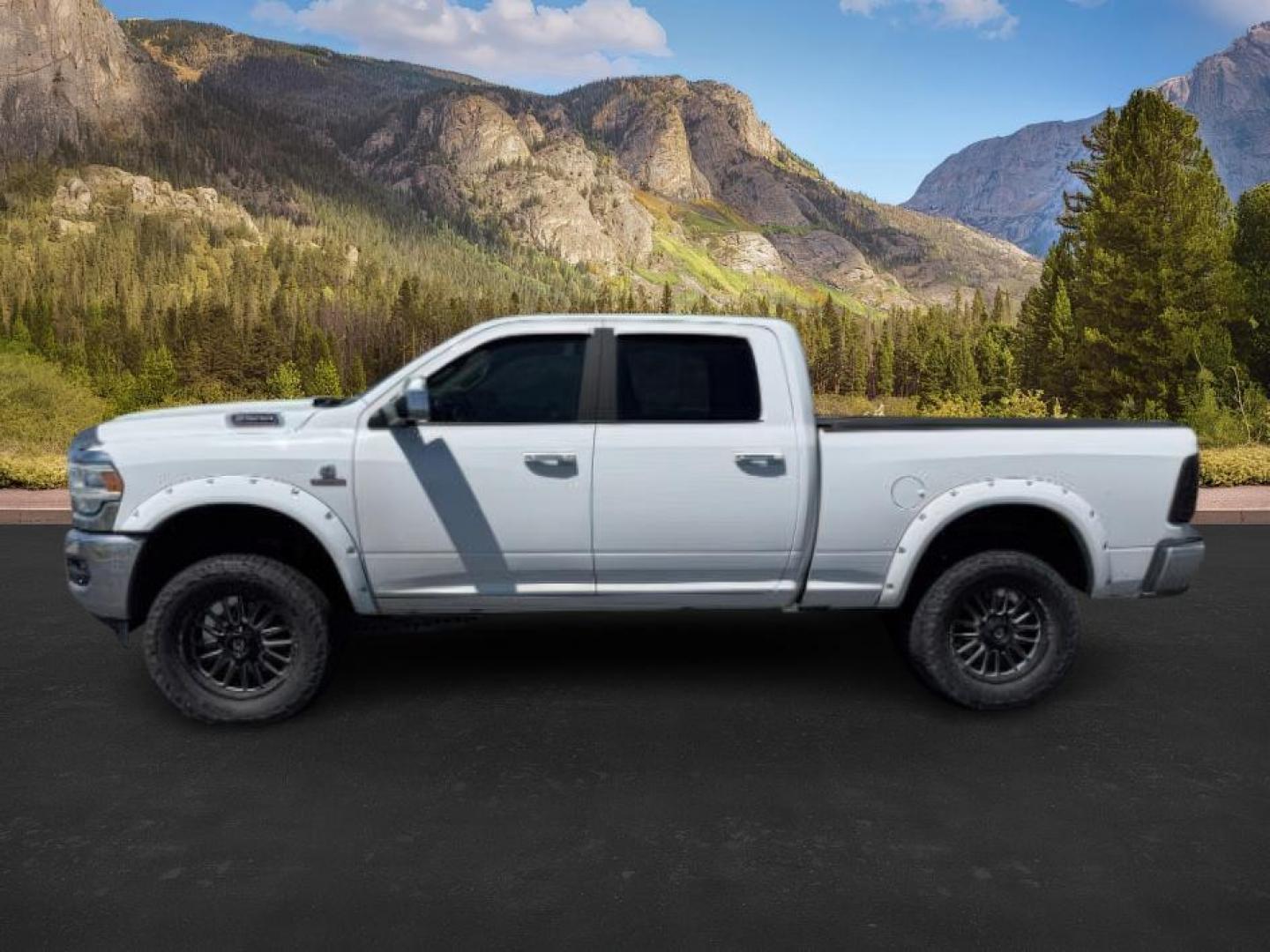 2020 Pearl White /Black Ram 2500 (3C6UR5FL0LG) with an Cummins 67L I-6 diesel direct injection engine, Automatic transmission, located at 1175 N Woodruff Ave, Idaho Falls, ID, 83401, 43.506901, -111.999657 - At Timberline Auto, finding a great deal on your next vehicle is always easy! Our experienced sales staff's goal is to help find you the right vehicle at the right price! Our knowledgeable finance department has options for almost any credit score. We offer extended service contract options to prote - Photo#0