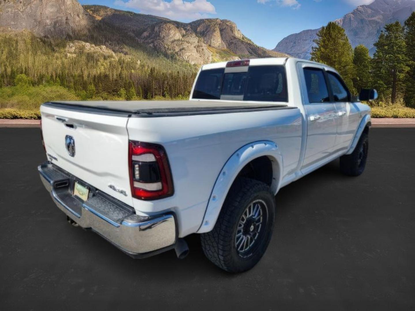 2020 Pearl White /Black Ram 2500 (3C6UR5FL0LG) with an Cummins 67L I-6 diesel direct injection engine, Automatic transmission, located at 1175 N Woodruff Ave, Idaho Falls, ID, 83401, 43.506901, -111.999657 - At Timberline Auto, finding a great deal on your next vehicle is always easy! Our experienced sales staff's goal is to help find you the right vehicle at the right price! Our knowledgeable finance department has options for almost any credit score. We offer extended service contract options to prote - Photo#5