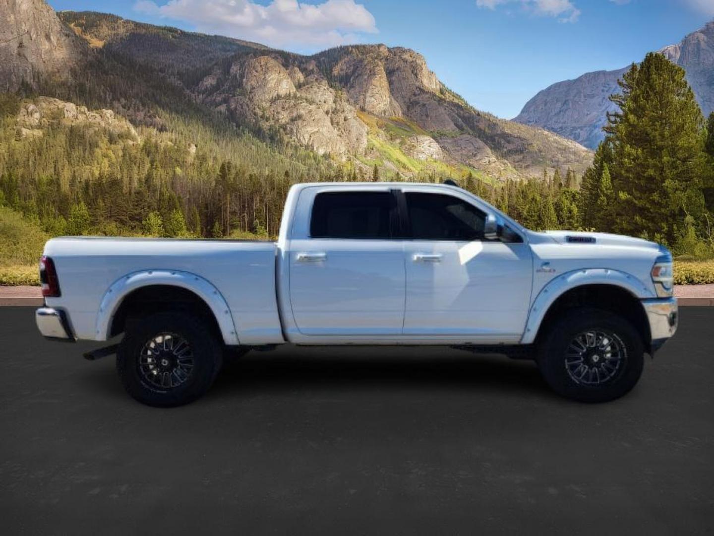 2020 Pearl White /Black Ram 2500 (3C6UR5FL0LG) with an Cummins 67L I-6 diesel direct injection engine, Automatic transmission, located at 1175 N Woodruff Ave, Idaho Falls, ID, 83401, 43.506901, -111.999657 - At Timberline Auto, finding a great deal on your next vehicle is always easy! Our experienced sales staff's goal is to help find you the right vehicle at the right price! Our knowledgeable finance department has options for almost any credit score. We offer extended service contract options to prote - Photo#6