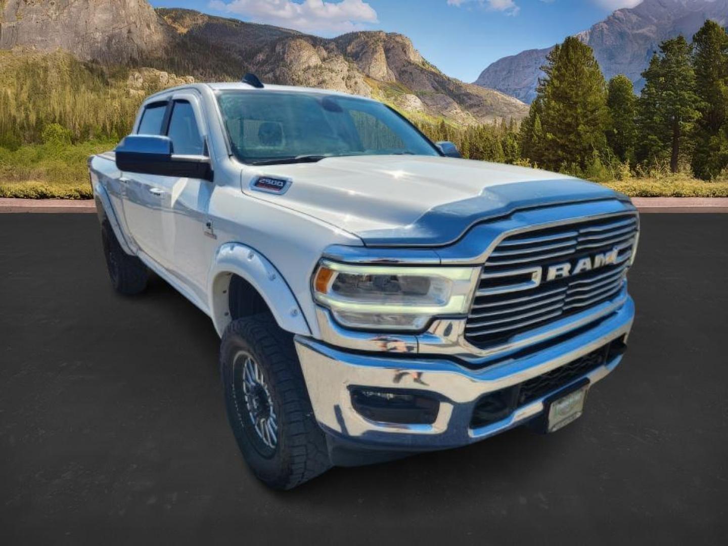 2020 Pearl White /Black Ram 2500 (3C6UR5FL0LG) with an Cummins 67L I-6 diesel direct injection engine, Automatic transmission, located at 1175 N Woodruff Ave, Idaho Falls, ID, 83401, 43.506901, -111.999657 - At Timberline Auto, finding a great deal on your next vehicle is always easy! Our experienced sales staff's goal is to help find you the right vehicle at the right price! Our knowledgeable finance department has options for almost any credit score. We offer extended service contract options to prote - Photo#7
