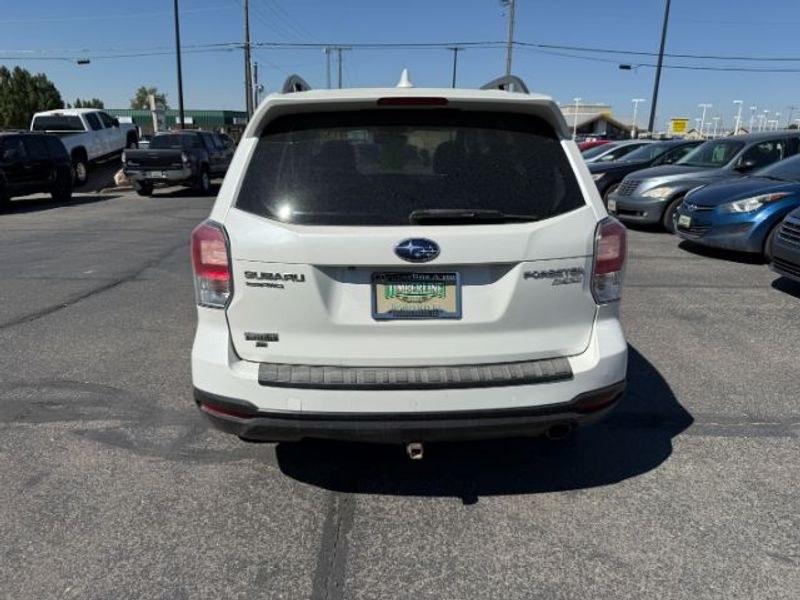 2017 Crystal White Pearl /Saddle Brown Subaru Forester Touring (JF2SJATC9HH) with an 4 Cyl, 2.5L engine, 6-speed CVT transmission, located at 1175 N Woodruff Ave, Idaho Falls, ID, 83401, 43.506901, -111.999657 - <b>Vehicle Details</b><br>Looking for a versatile pre-owned SUV in Idaho Falls, ID? This 2017 Subaru Forester 2.5i Touring AWD is a smart choice for drivers who want capability, comfort, and confidence in changing road conditions. Powered by a 4-cylinder 2.5L gasoline engine, this Subaru Forester de- Photo#3