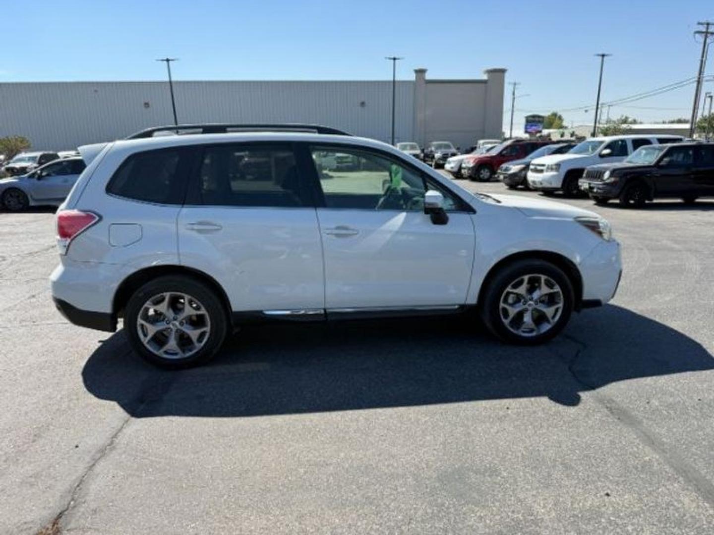 2017 Crystal White Pearl /Saddle Brown Subaru Forester Touring (JF2SJATC9HH) with an 4 Cyl, 2.5L engine, 6-speed CVT transmission, located at 1175 N Woodruff Ave, Idaho Falls, ID, 83401, 43.506901, -111.999657 - <b>Vehicle Details</b><br>Looking for a versatile pre-owned SUV in Idaho Falls, ID? This 2017 Subaru Forester 2.5i Touring AWD is a smart choice for drivers who want capability, comfort, and confidence in changing road conditions. Powered by a 4-cylinder 2.5L gasoline engine, this Subaru Forester de- Photo#8