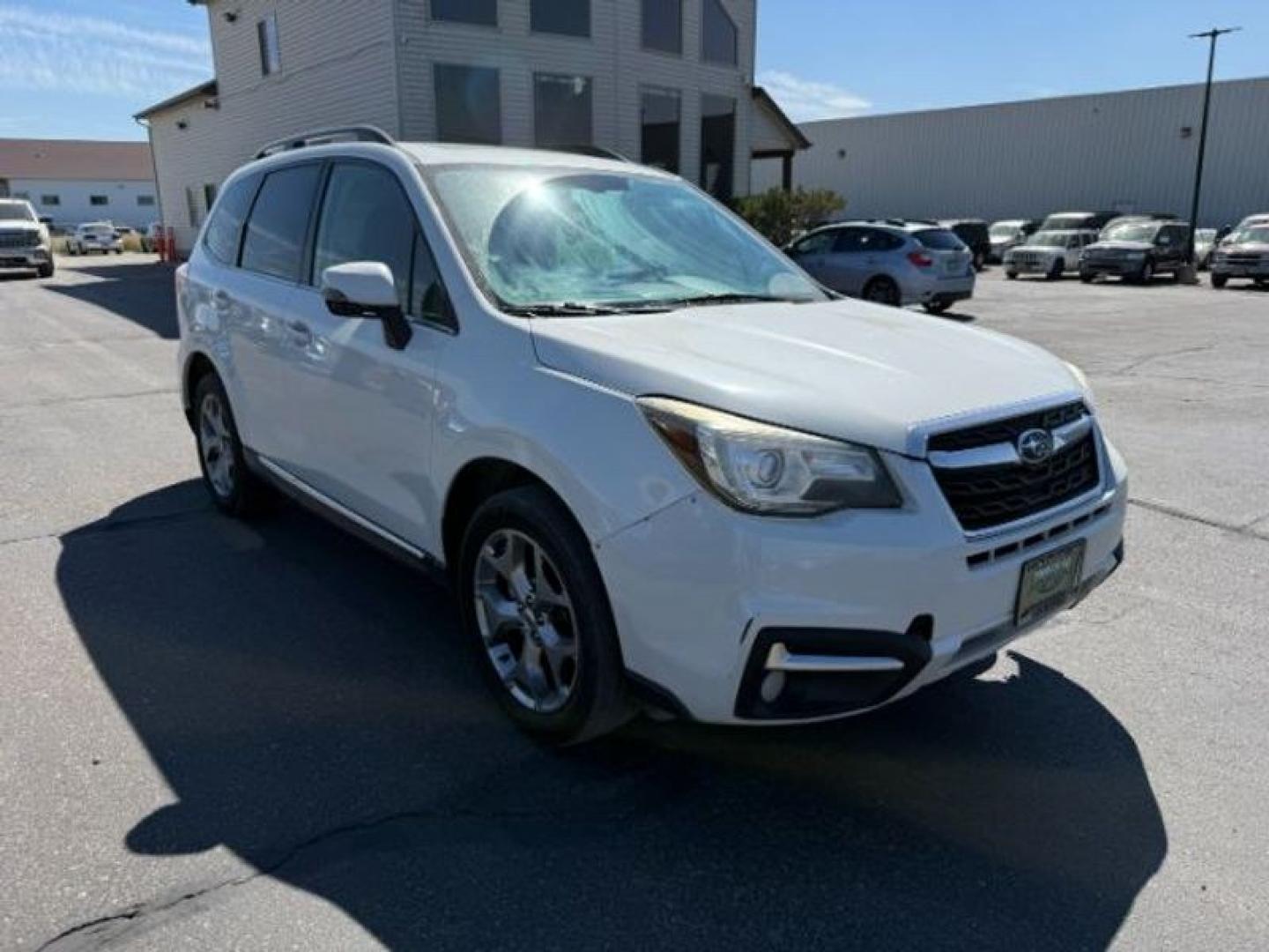 2017 Crystal White Pearl /Saddle Brown Subaru Forester Touring (JF2SJATC9HH) with an 4 Cyl, 2.5L engine, 6-speed CVT transmission, located at 1175 N Woodruff Ave, Idaho Falls, ID, 83401, 43.506901, -111.999657 - <b>Vehicle Details</b><br>Looking for a versatile pre-owned SUV in Idaho Falls, ID? This 2017 Subaru Forester 2.5i Touring AWD is a smart choice for drivers who want capability, comfort, and confidence in changing road conditions. Powered by a 4-cylinder 2.5L gasoline engine, this Subaru Forester de- Photo#9
