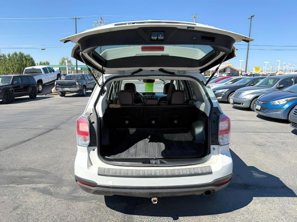 2017 Crystal White Pearl /Black Subaru Forester 2.5i Touring (JF2SJATC9HH) with an 2.5L H-4 DOHC engine, AUTOMATIC transmission, located at 1235 N Woodruff Ave., Idaho Falls, 83401, (208) 523-1053, 43.507172, -112.000488 - Photo#5