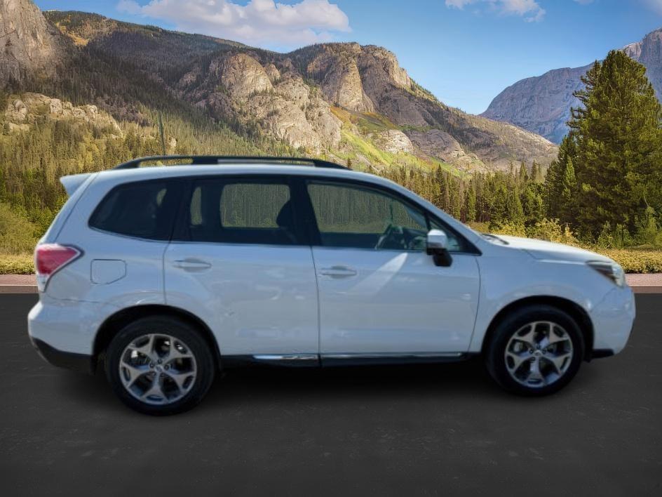 2017 Crystal White Pearl /Black Subaru Forester 2.5i Touring (JF2SJATC9HH) with an 2.5L H-4 DOHC engine, AUTOMATIC transmission, located at 1235 N Woodruff Ave., Idaho Falls, 83401, (208) 523-1053, 43.507172, -112.000488 - Photo#8