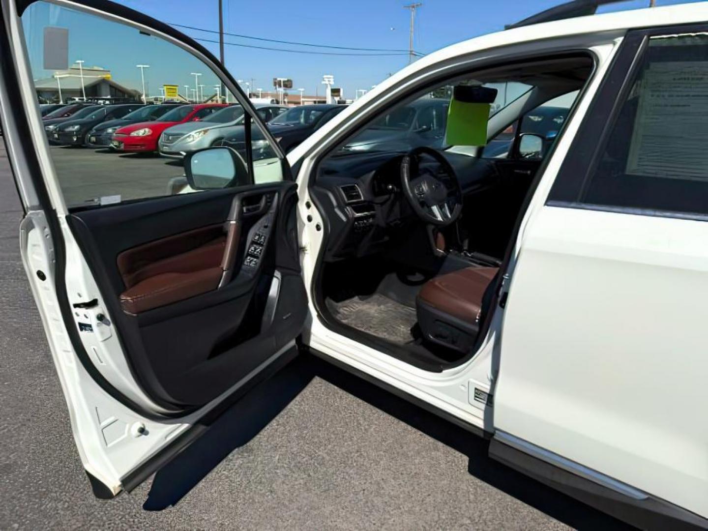2017 Crystal White Pearl /Black Subaru Forester (JF2SJATC9HH) with an 25L H-4 DOHC engine, Automatic transmission, located at 1175 N Woodruff Ave, Idaho Falls, ID, 83401, 43.506901, -111.999657 - At Timberline Auto, finding a great deal on your next vehicle is always easy! Our experienced sales staff's goal is to help find you the right vehicle at the right price! Our knowledgeable finance department has options for almost any credit score. We offer extended service contract options to prote - Photo#12