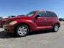 2006 Inferno Red Crystal Pearl /Pastel Pebble Beige Cloth Interior Chrysler PT Cruiser Touring Edition (3A4FY58B76T) with an 2.4L L4 DOHC 16V engine, 4-Speed Automatic transmission, located at 1235 N Woodruff Ave., Idaho Falls, 83401, (208) 523-1053, 43.507172, -112.000488 - At Timberline Auto, finding a great deal on your next vehicle is always easy! Our experienced sales staff's goal is to help find you the right vehicle at the right price! Our knowledgeable finance department has options for almost any credit score. We offer extended service contract options to prote - Photo#1