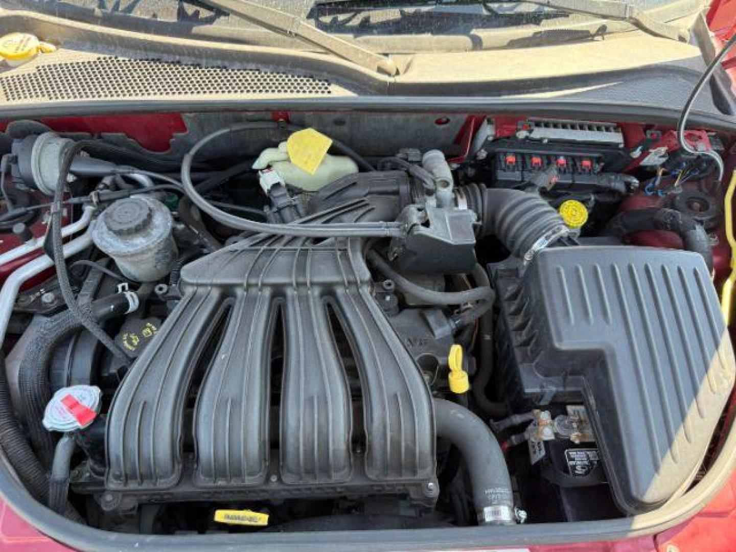 2006 Inferno Red Crystal Pearl /Pastel Pebble Beige Cloth Interior Chrysler PT Cruiser (3A4FY58B76T) with an 24L L4 DOHC 16V engine, Automatic transmission, located at 1175 N Woodruff Ave, Idaho Falls, ID, 83401, 43.506901, -111.999657 - Photo#37