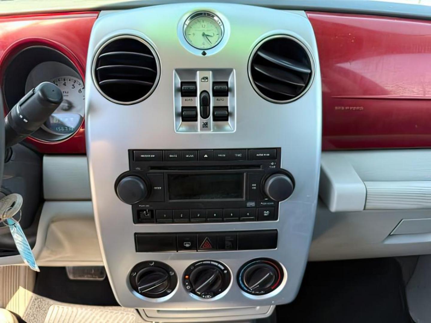 2006 Inferno Red Crystal Pearl /Pastel Pebble Beige Cloth Interior Chrysler PT Cruiser (3A4FY58B76T) with an 24L L4 DOHC 16V engine, Automatic transmission, located at 1175 N Woodruff Ave, Idaho Falls, ID, 83401, 43.506901, -111.999657 - Photo#13