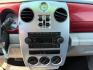 2006 Inferno Red Crystal Pearl /Pastel Pebble Beige Cloth Interior Chrysler PT Cruiser (3A4FY58B76T) with an 24L L4 DOHC 16V engine, Automatic transmission, located at 1175 N Woodruff Ave, Idaho Falls, ID, 83401, 43.506901, -111.999657 - Photo#13