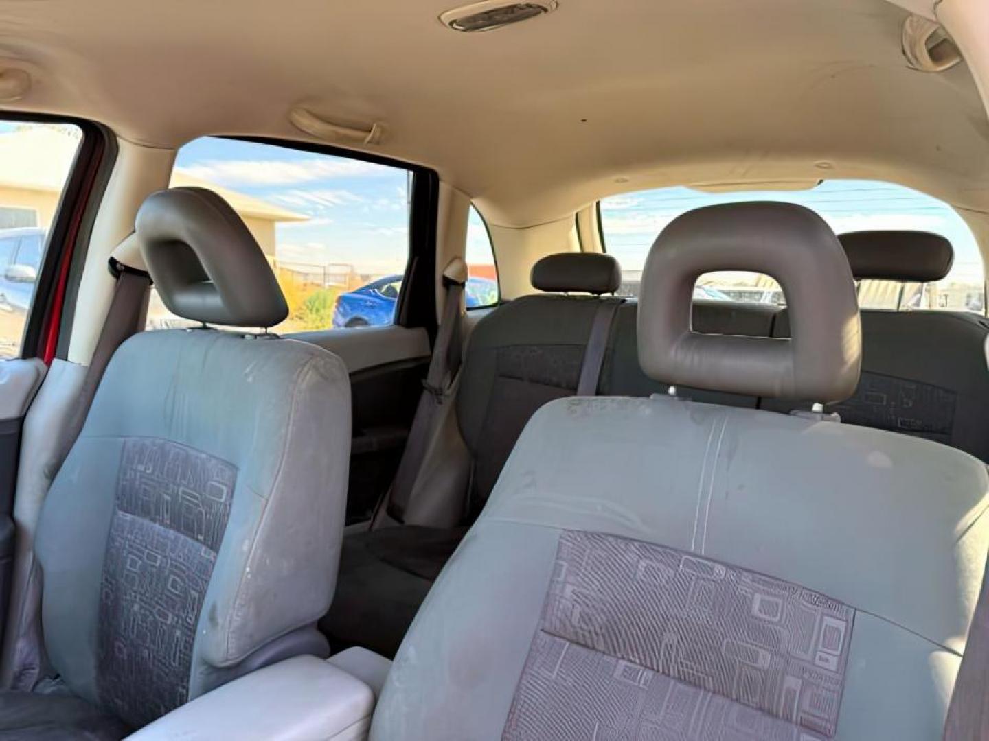 2006 Inferno Red Crystal Pearl /Pastel Pebble Beige Cloth Interior Chrysler PT Cruiser (3A4FY58B76T) with an 24L L4 DOHC 16V engine, Automatic transmission, located at 1175 N Woodruff Ave, Idaho Falls, ID, 83401, 43.506901, -111.999657 - Photo#14
