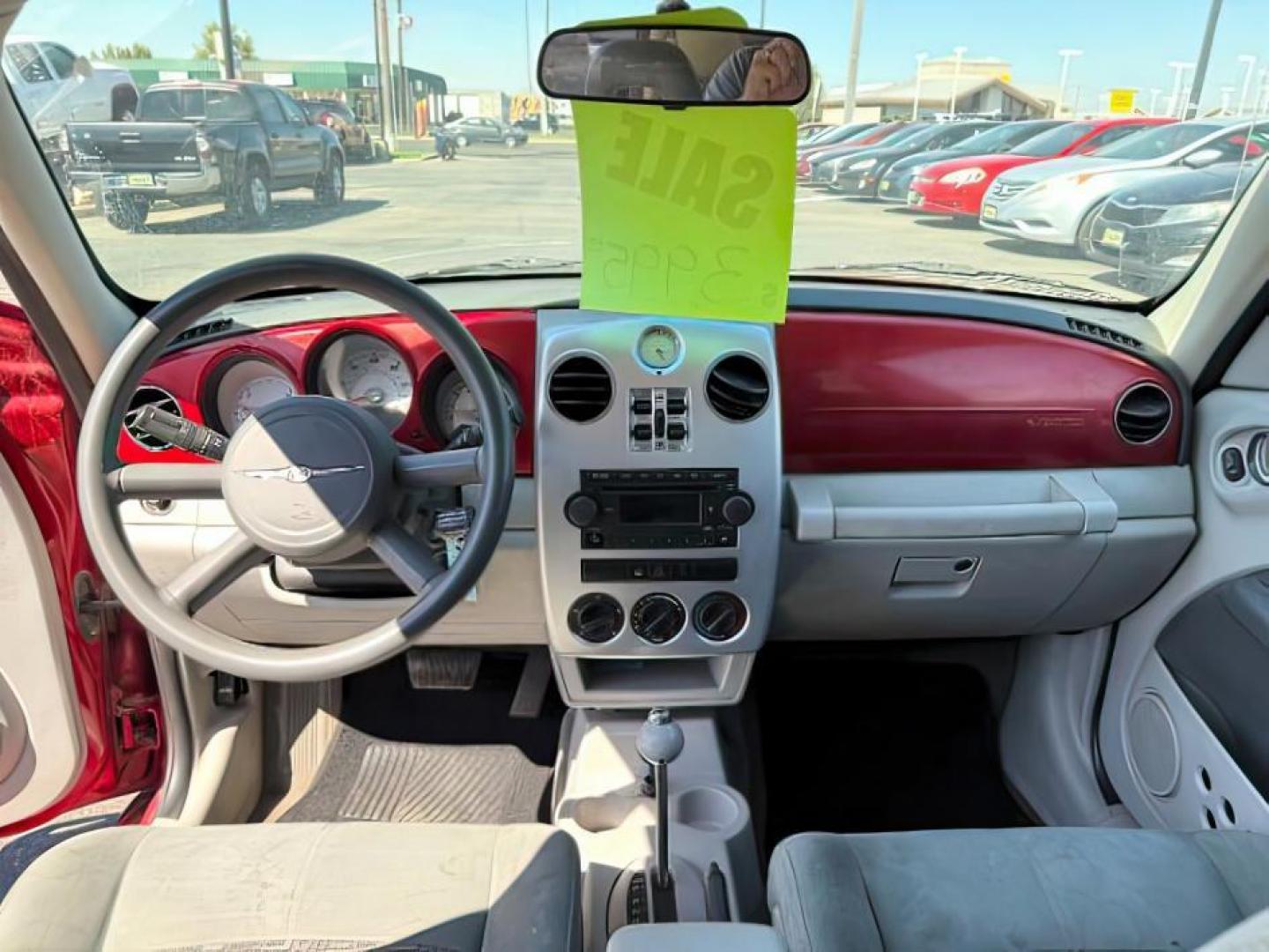 2006 Inferno Red Crystal Pearl /Pastel Pebble Beige Cloth Interior Chrysler PT Cruiser (3A4FY58B76T) with an 24L L4 DOHC 16V engine, Automatic transmission, located at 1175 N Woodruff Ave, Idaho Falls, ID, 83401, 43.506901, -111.999657 - Photo#16