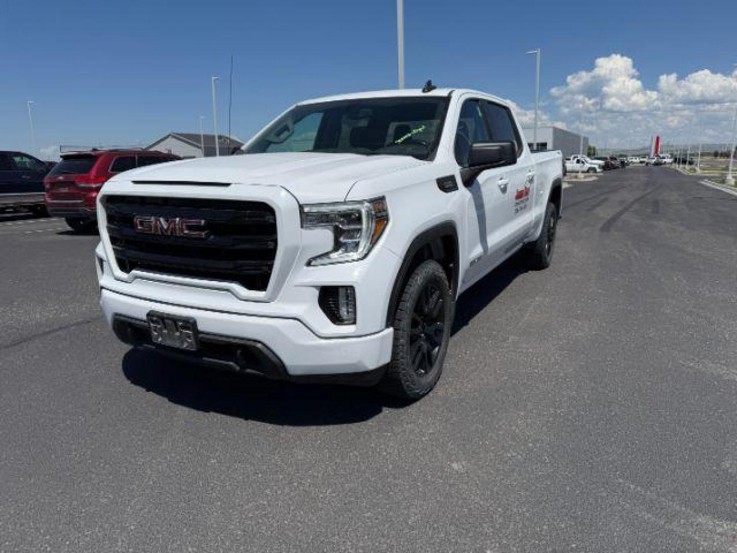2021 Summit White /Jet Black GMC Sierra 1500 4WD Crew Cab Standard Box Elevation (3GTU9CET8MG) with an Duramax 3L I-6 diesel direct injection engine, AUTOMATIC transmission, located at 1235 N Woodruff Ave., Idaho Falls, 83401, (208) 523-1053, 43.507172, -112.000488 - At Timberline Auto, finding a great deal on your next vehicle is always easy! Our experienced sales staff's goal is to help find you the right vehicle at the right price! Our knowledgeable finance department has options for almost any credit score. We offer extended service contract options to prote - Photo#1