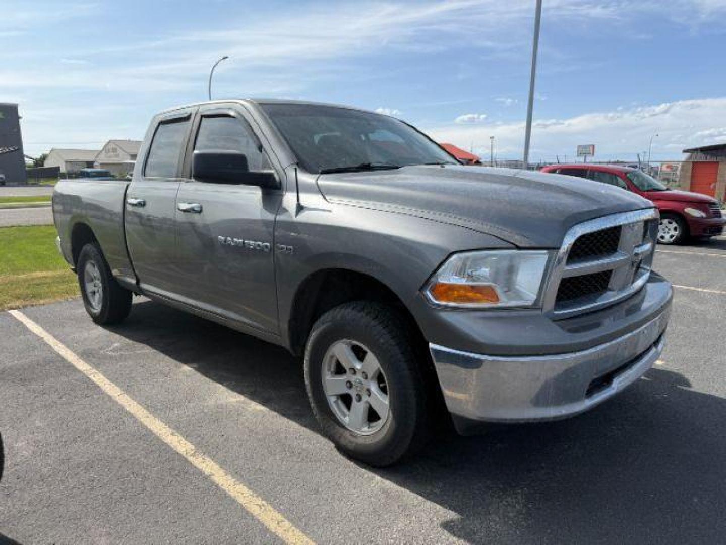 2012 GRAY /CLOTH Ram 1500 SLT (1C6RD7GTXCS) with an 5.7 V8 engine, AUTO transmission, located at 1235 N Woodruff Ave., Idaho Falls, 83401, (208) 523-1053, 43.507172, -112.000488 - At Timberline Auto, finding a great deal on your next vehicle is always easy! Our experienced sales staff's goal is to help find you the right vehicle at the right price! Our knowledgeable finance department has options for almost any credit score. We offer extended service contract options to prote - Photo#1