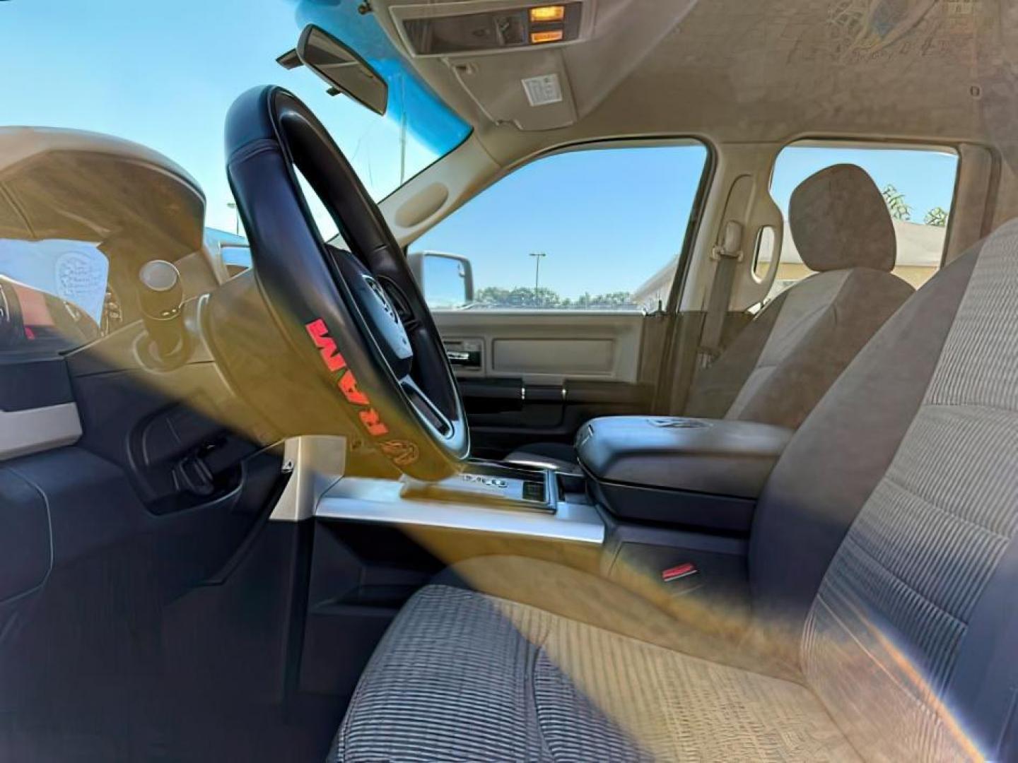 2012 GRAY /CLOTH Ram 1500 (1C6RD7GTXCS) with an 57 V8 engine, Automatic transmission, located at 1175 N Woodruff Ave, Idaho Falls, ID, 83401, 43.506901, -111.999657 - At Timberline Auto, finding a great deal on your next vehicle is always easy! Our experienced sales staff's goal is to help find you the right vehicle at the right price! Our knowledgeable finance department has options for almost any credit score. We offer extended service contract options to prote - Photo#10